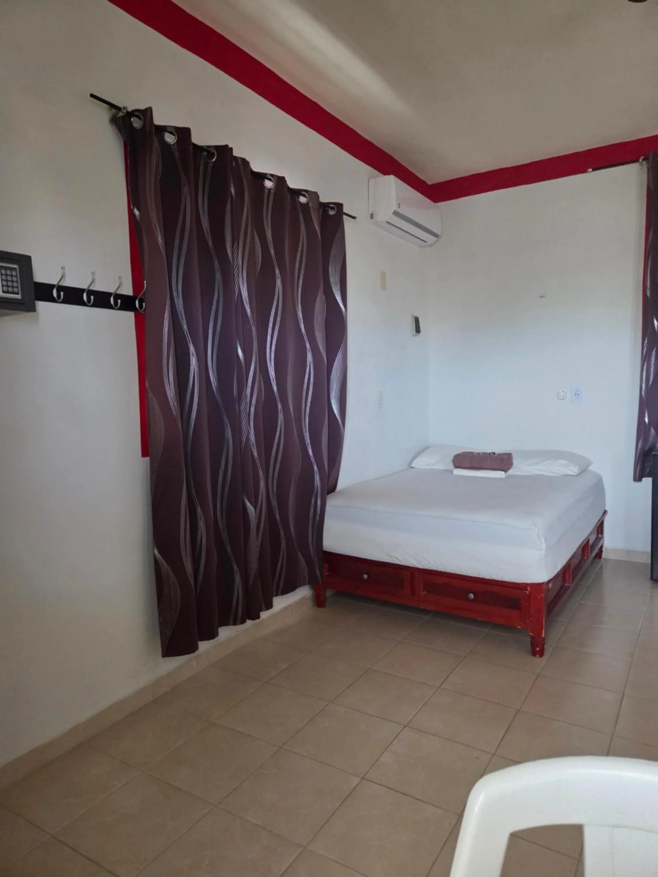 Photo of the whole room, Bed in El Padrino