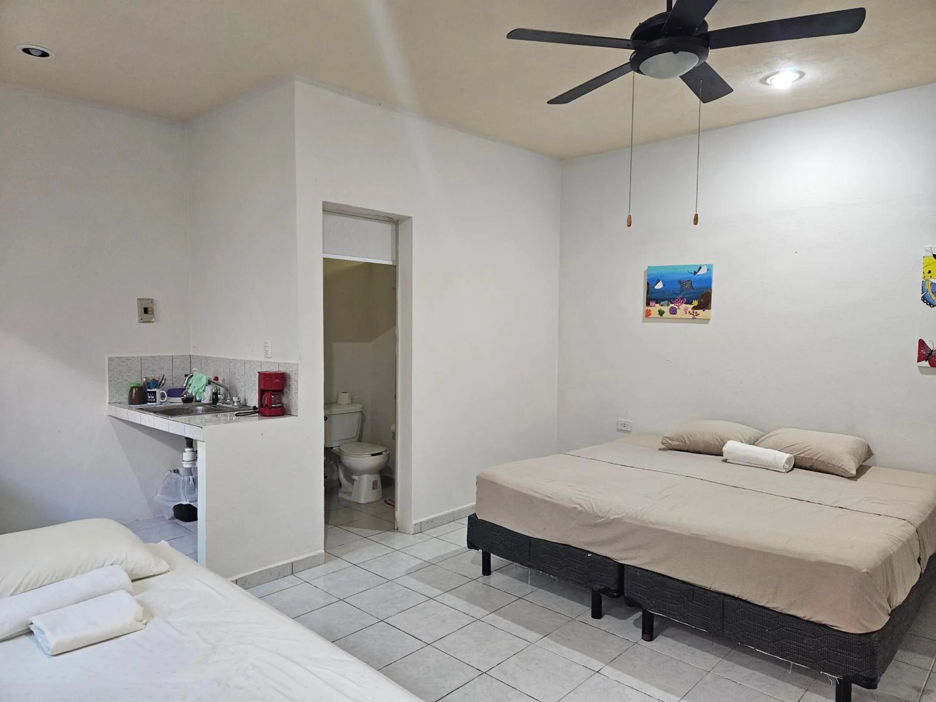 Photo of the whole room, Bed in El Padrino