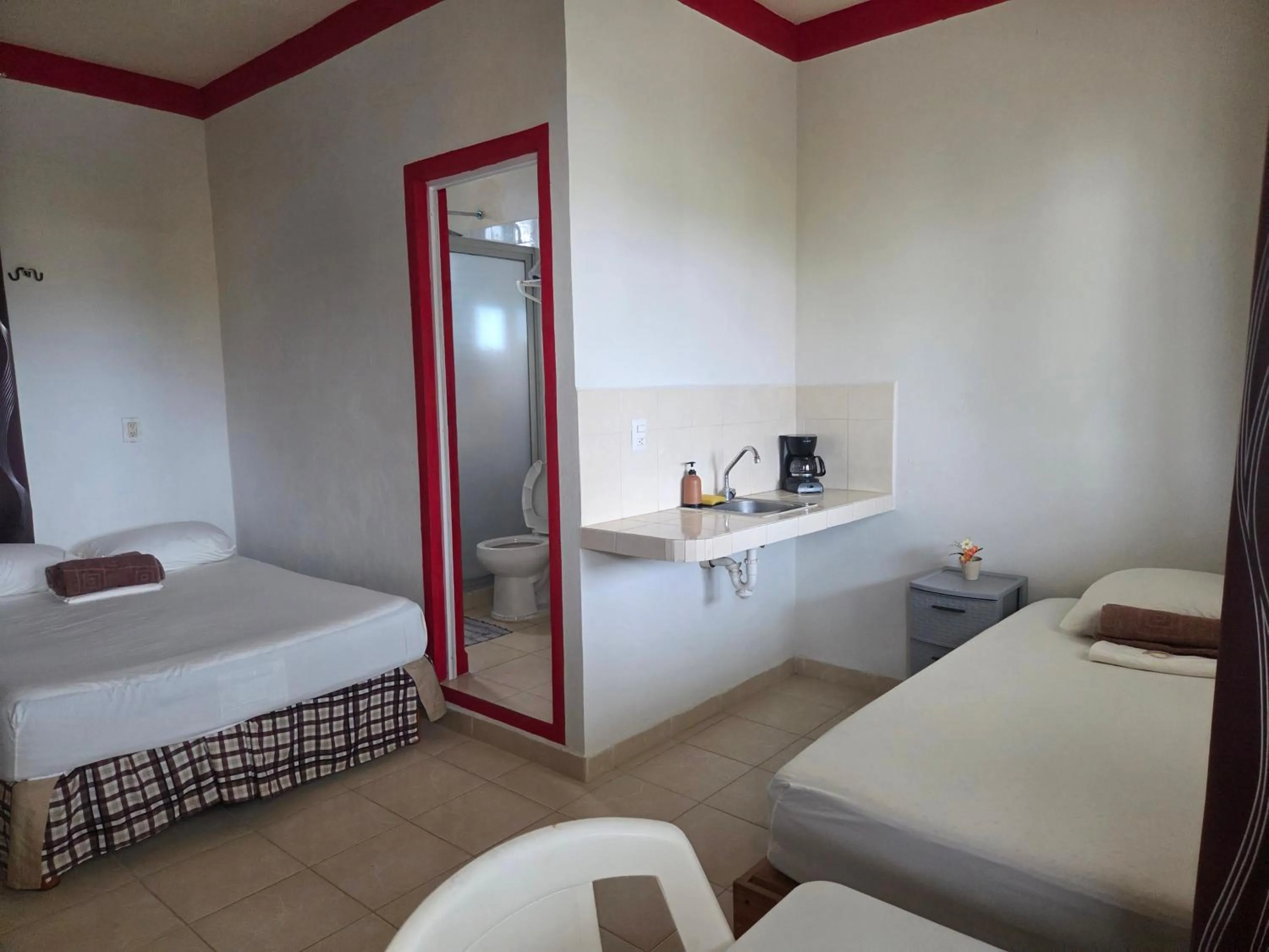 Photo of the whole room, Bed in El Padrino