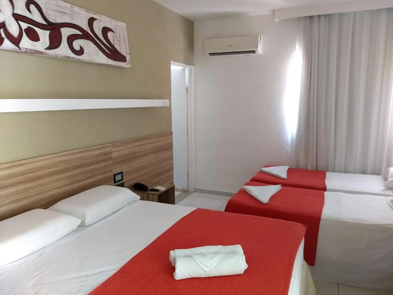 Bed in Pousada Aquarela Do Brasil