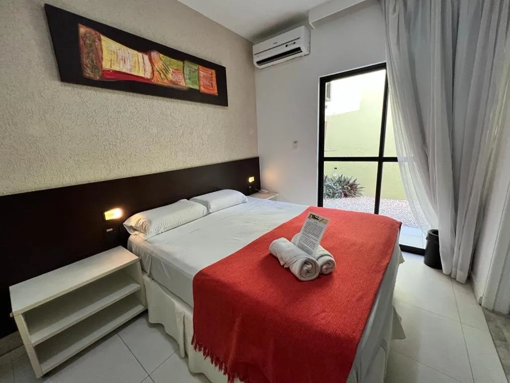 Bed in Pousada Aquarela Do Brasil