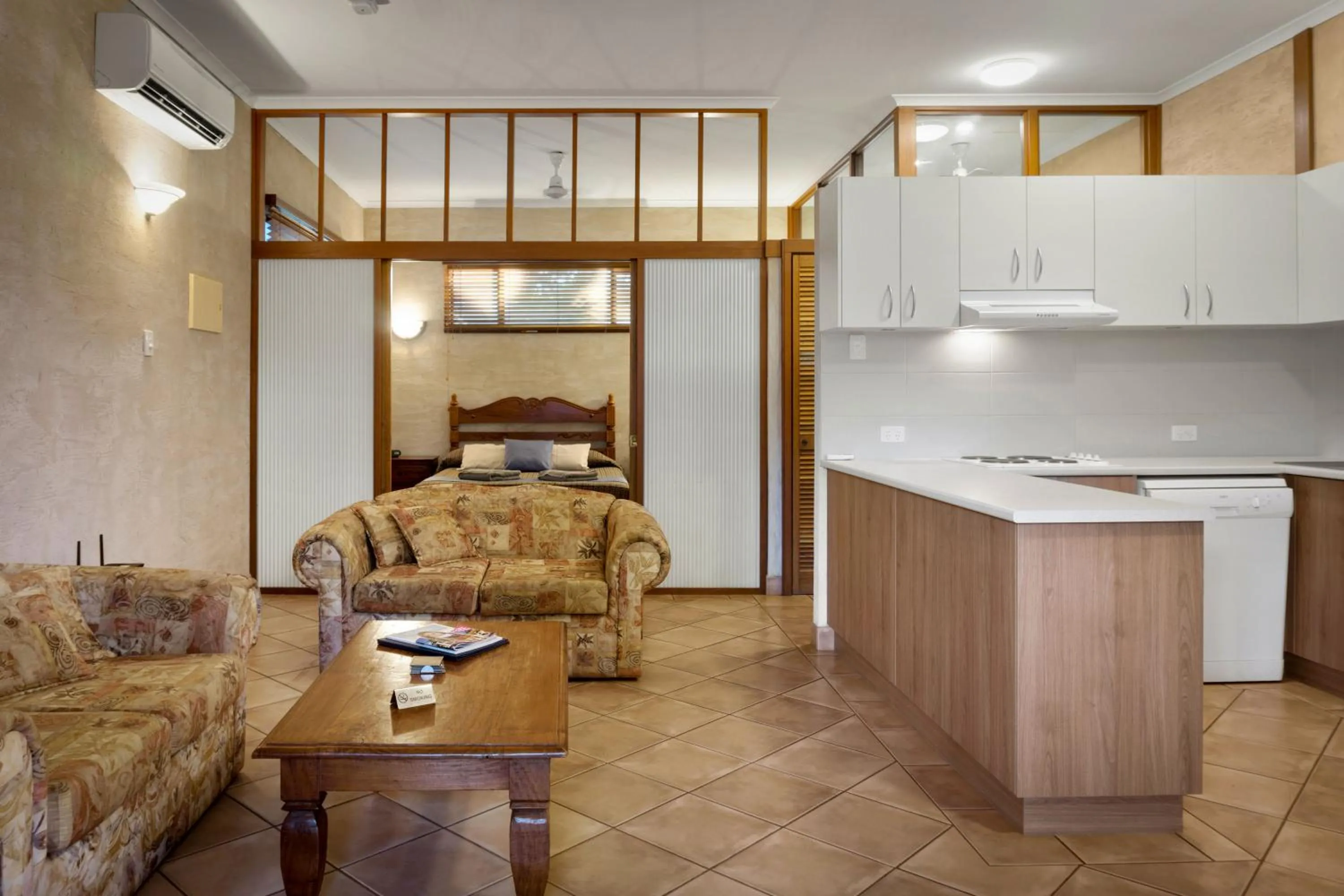 Kitchen or kitchenette, Bed in Blue Seas Resort