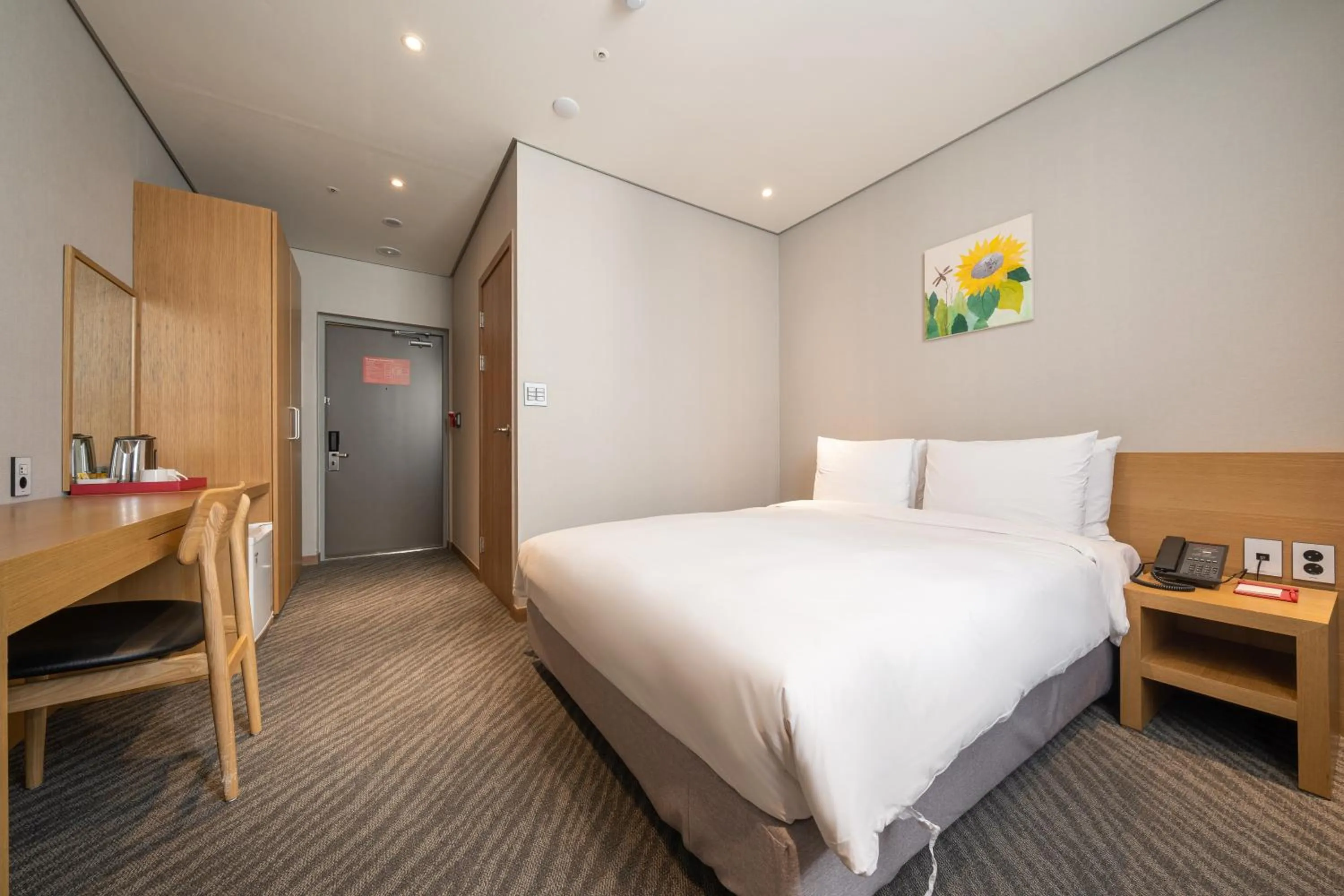 Bed in Ramada by Wyndham Seoul Dongdaemun