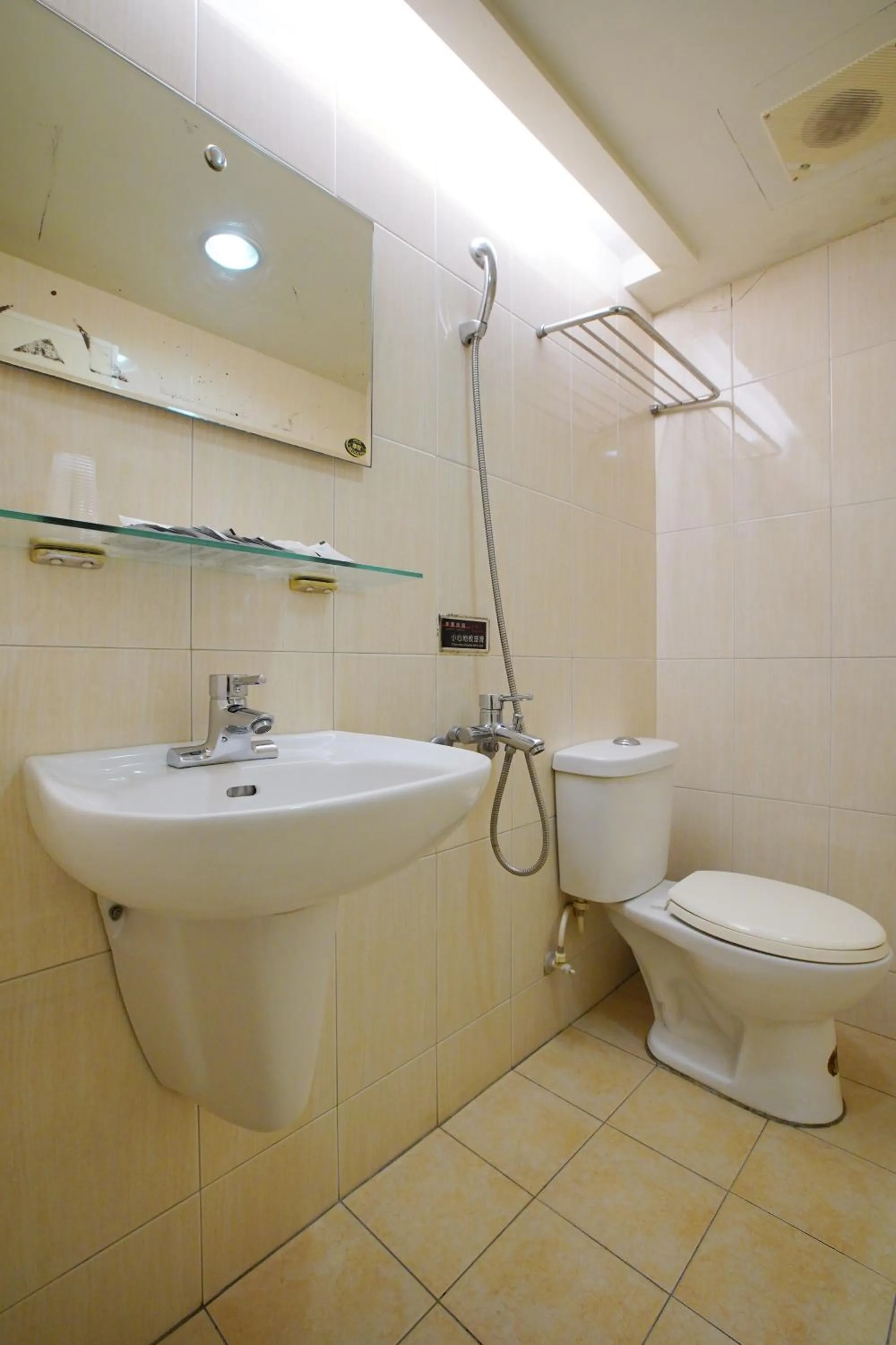 Bathroom in Happy Hotel