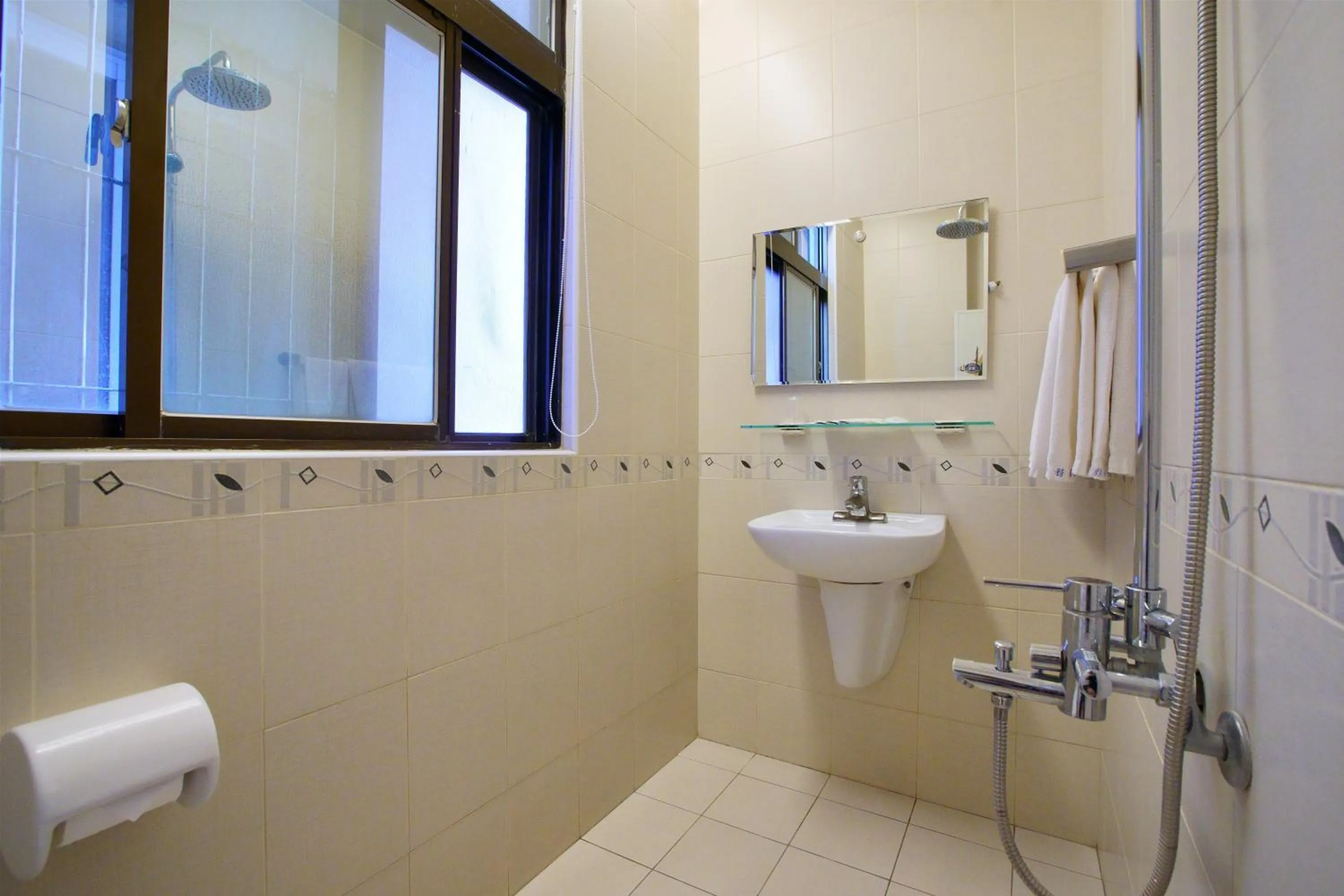 Bathroom in Happy Hotel