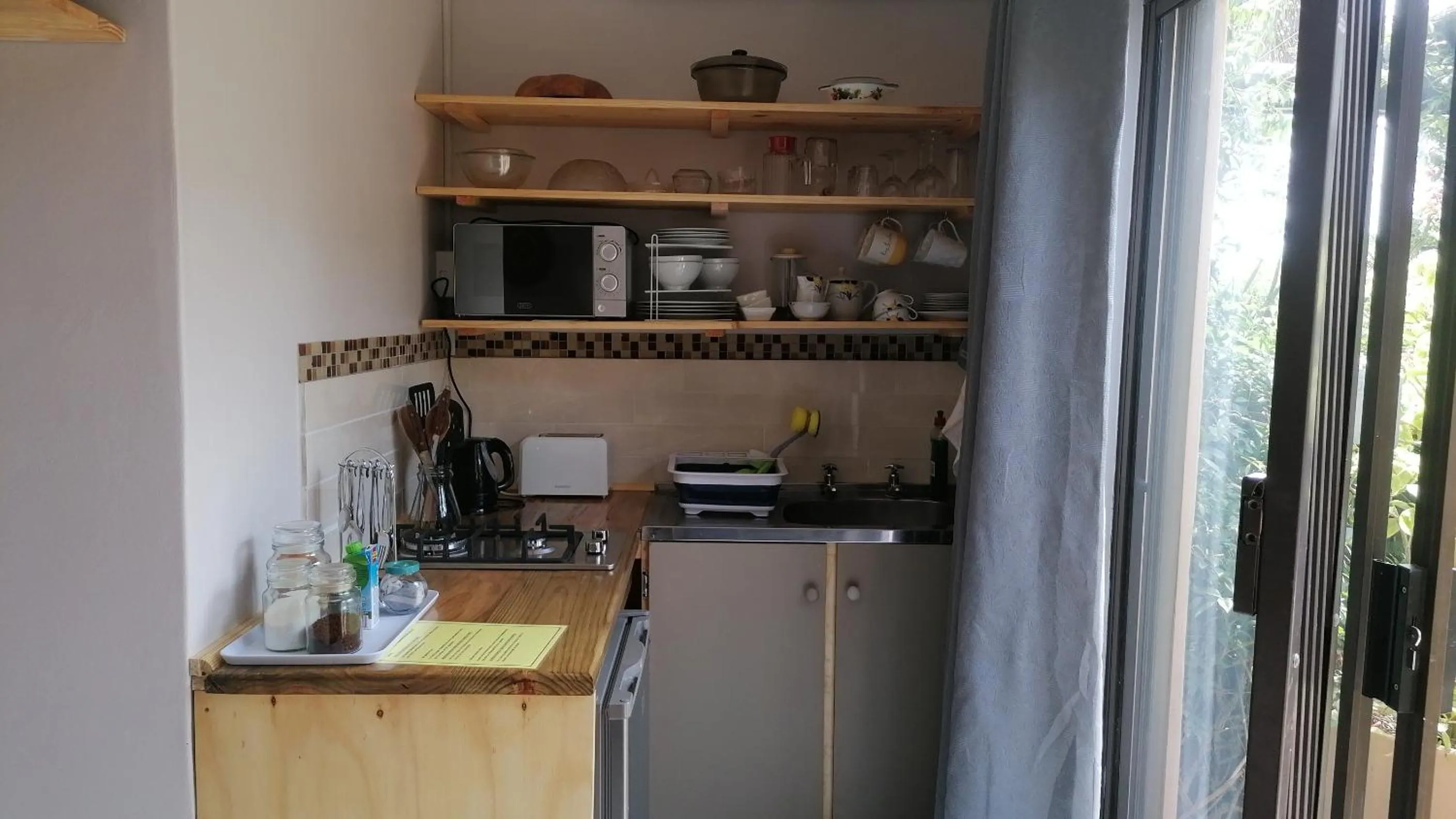 Kitchen or kitchenette in A1 Kynaston Guest House bed and breakfast or self catering