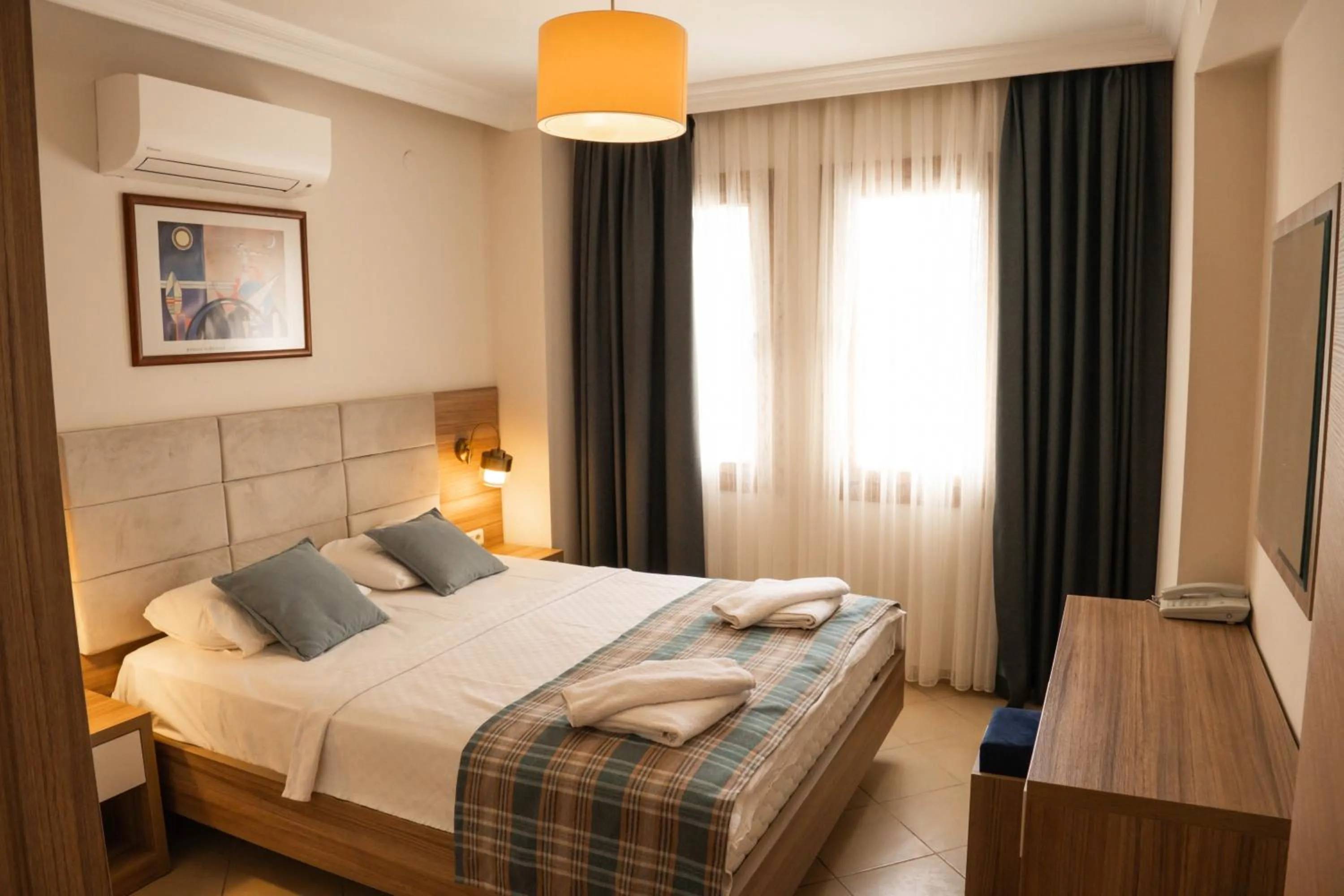 Bedroom, Bed in Perdikia Hill Hotel And Villas