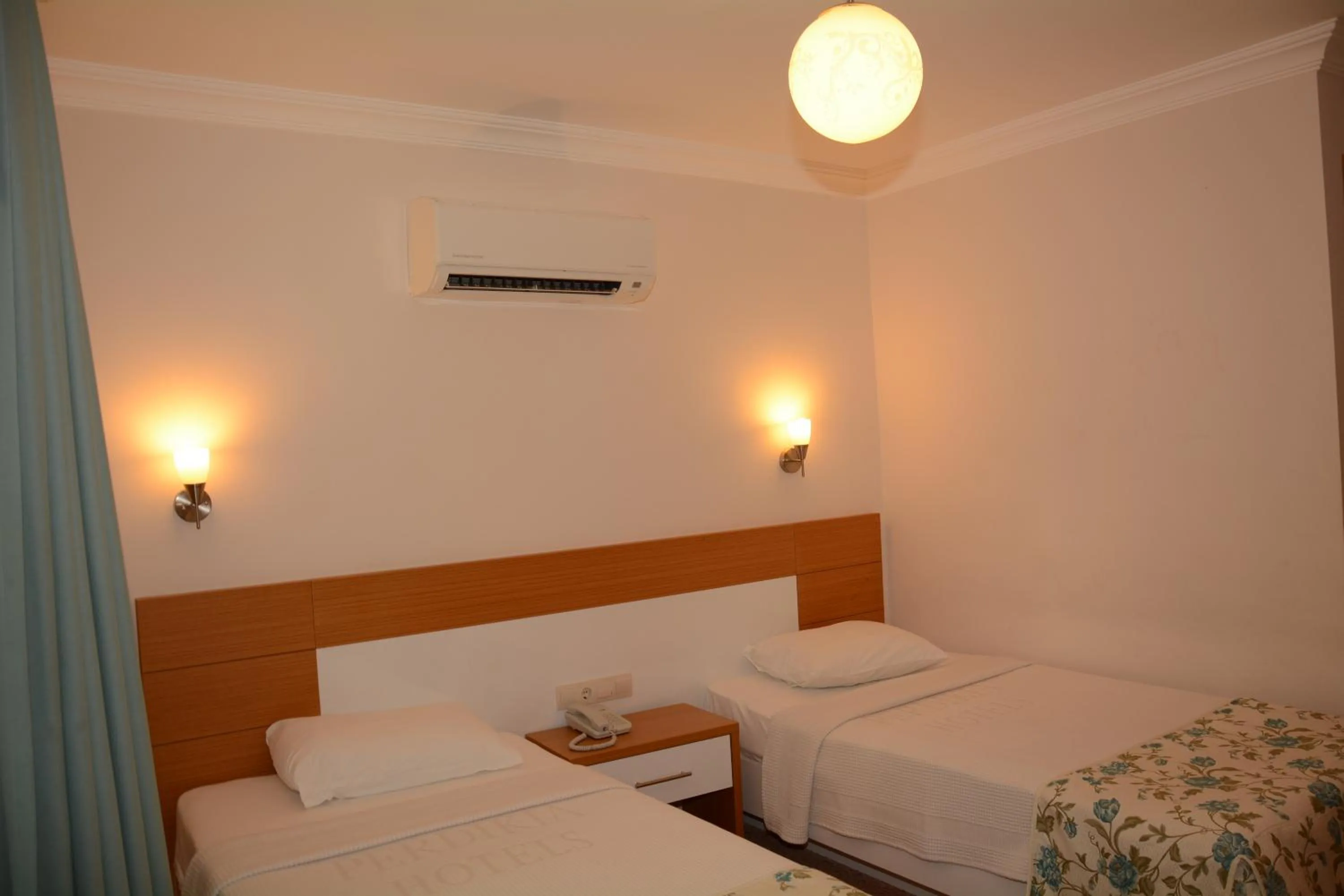 Bedroom, Bed in Perdikia Hill Hotel And Villas
