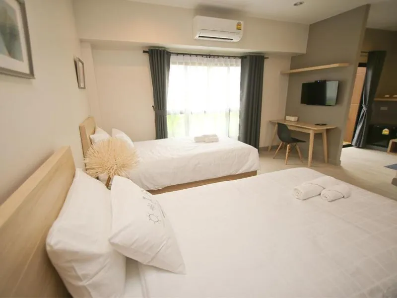 Bed in Bunprasop Garden Hotel