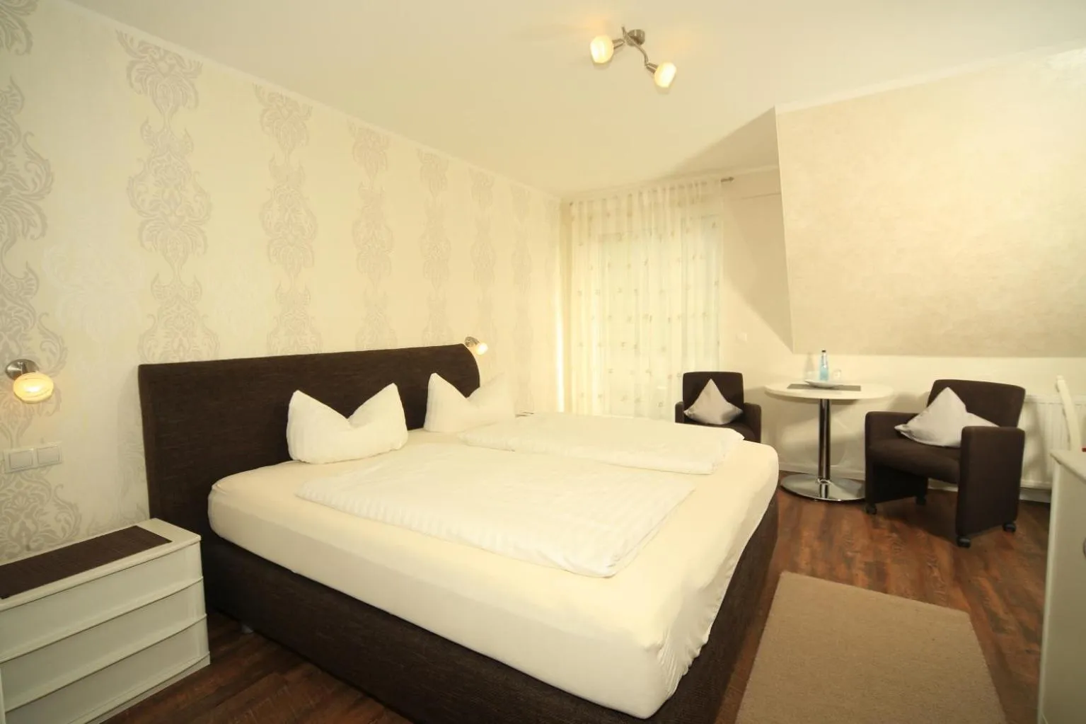 Photo of the whole room, Bed in PIEPers Hotel Garni