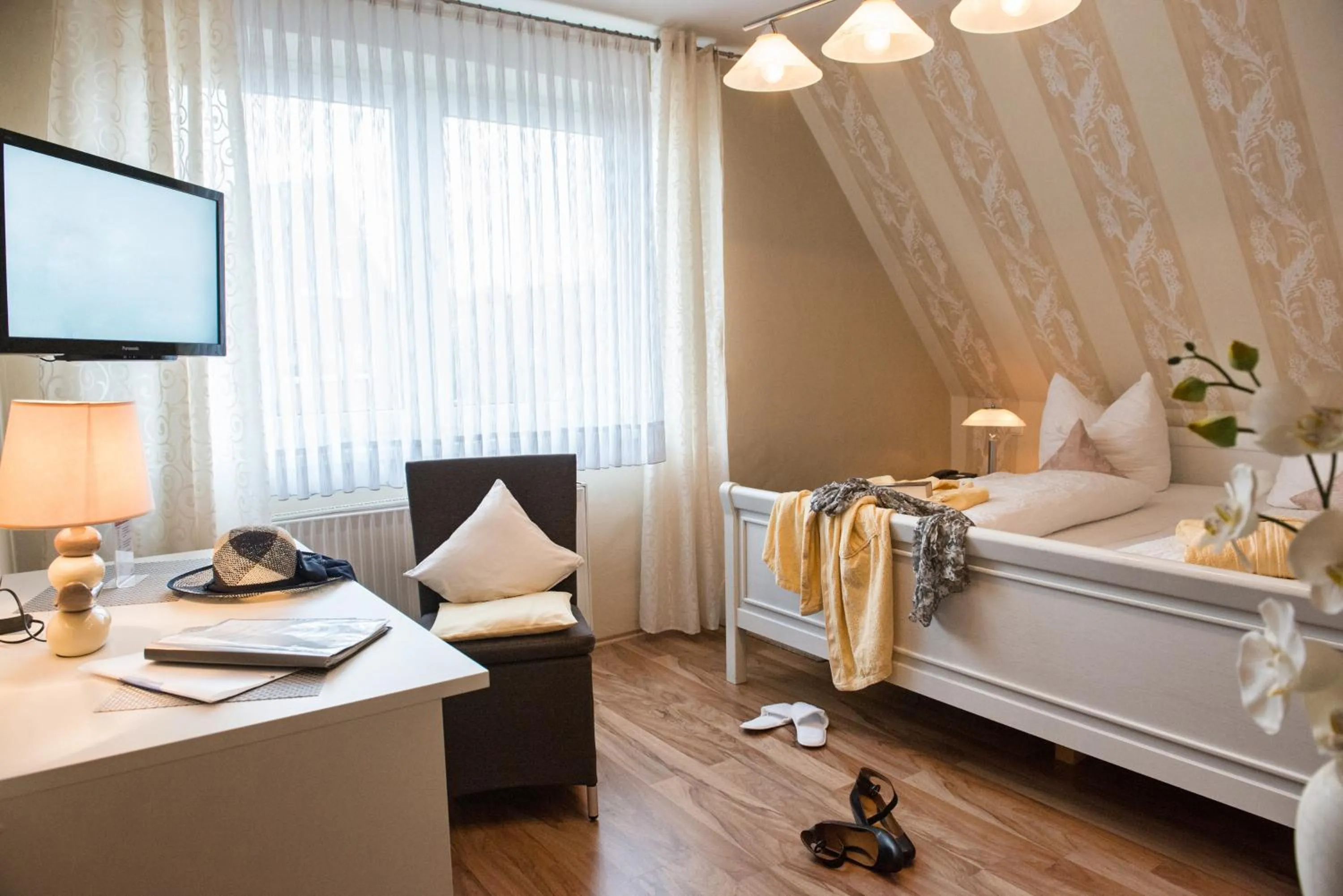 Photo of the whole room, Bed in PIEPers Hotel Garni