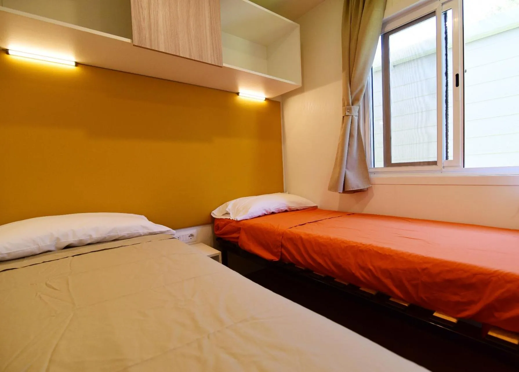 Bed in Club del Sole Adriano Family Camping Village