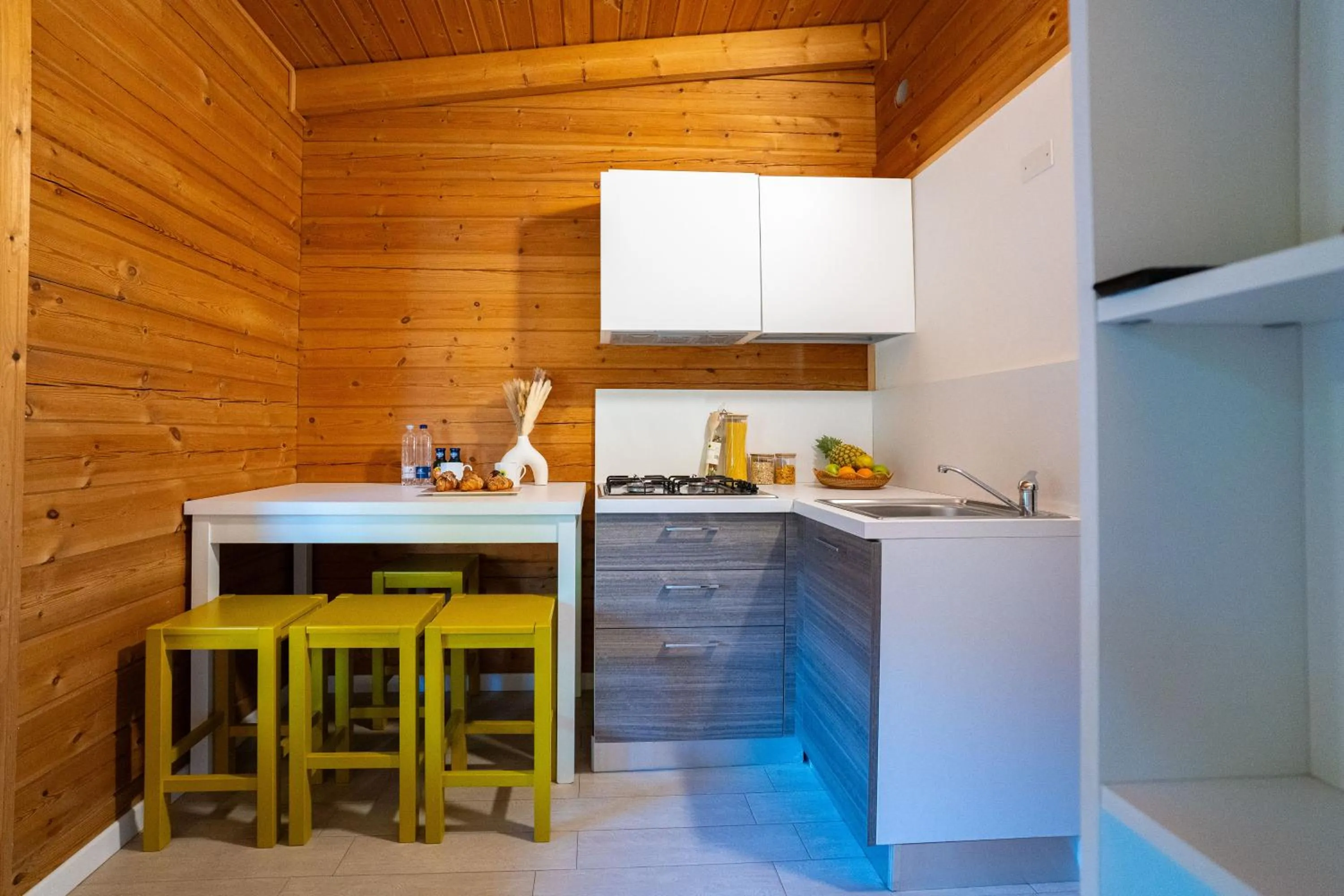 Kitchen or kitchenette in Club del Sole Adriano Family Camping Village