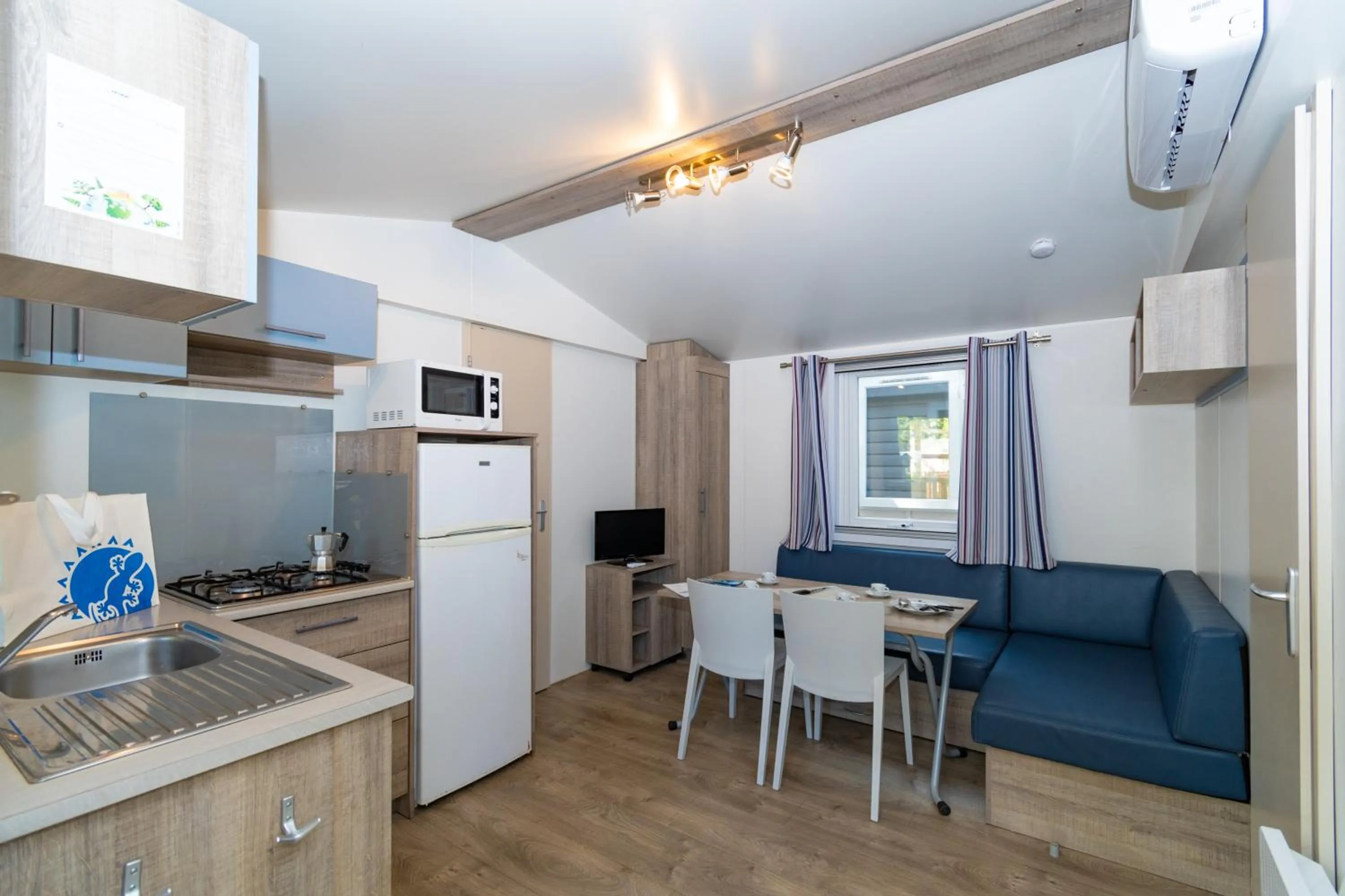 Kitchen or kitchenette in Club del Sole Adriano Family Camping Village