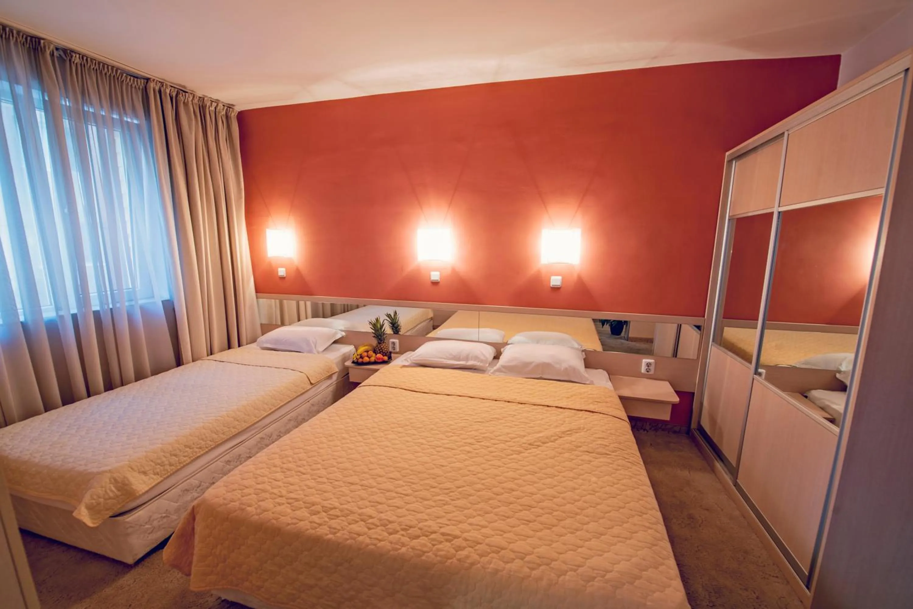 Bed in Family Hotel Gran Ivan