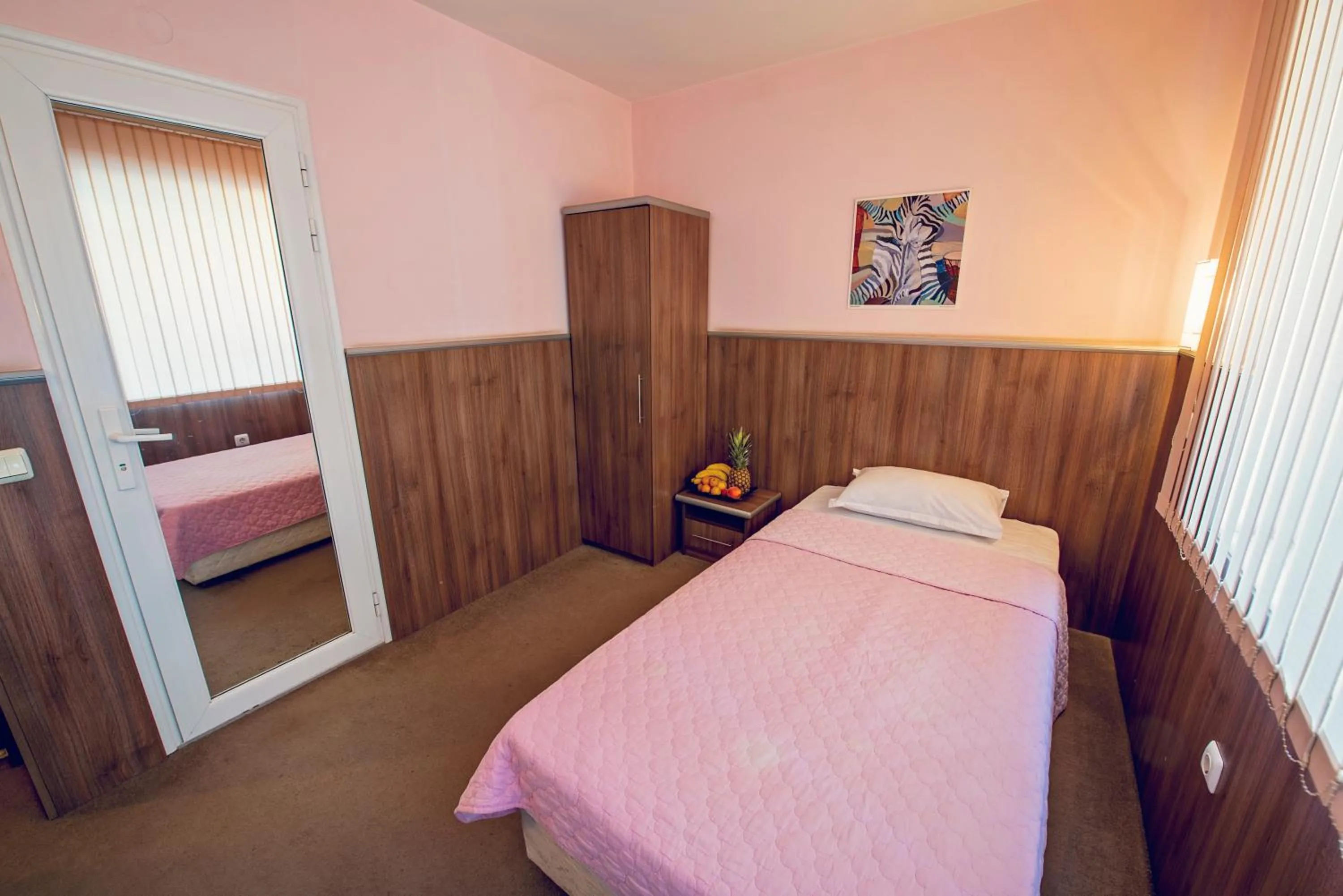 Bed in Family Hotel Gran Ivan