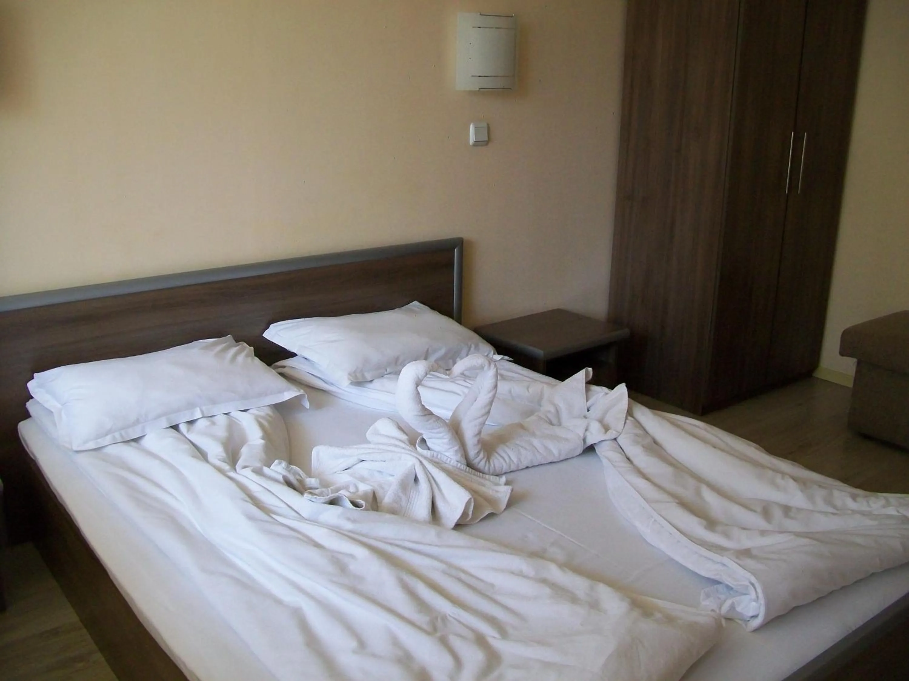 Bed in Family Hotel Gran Ivan