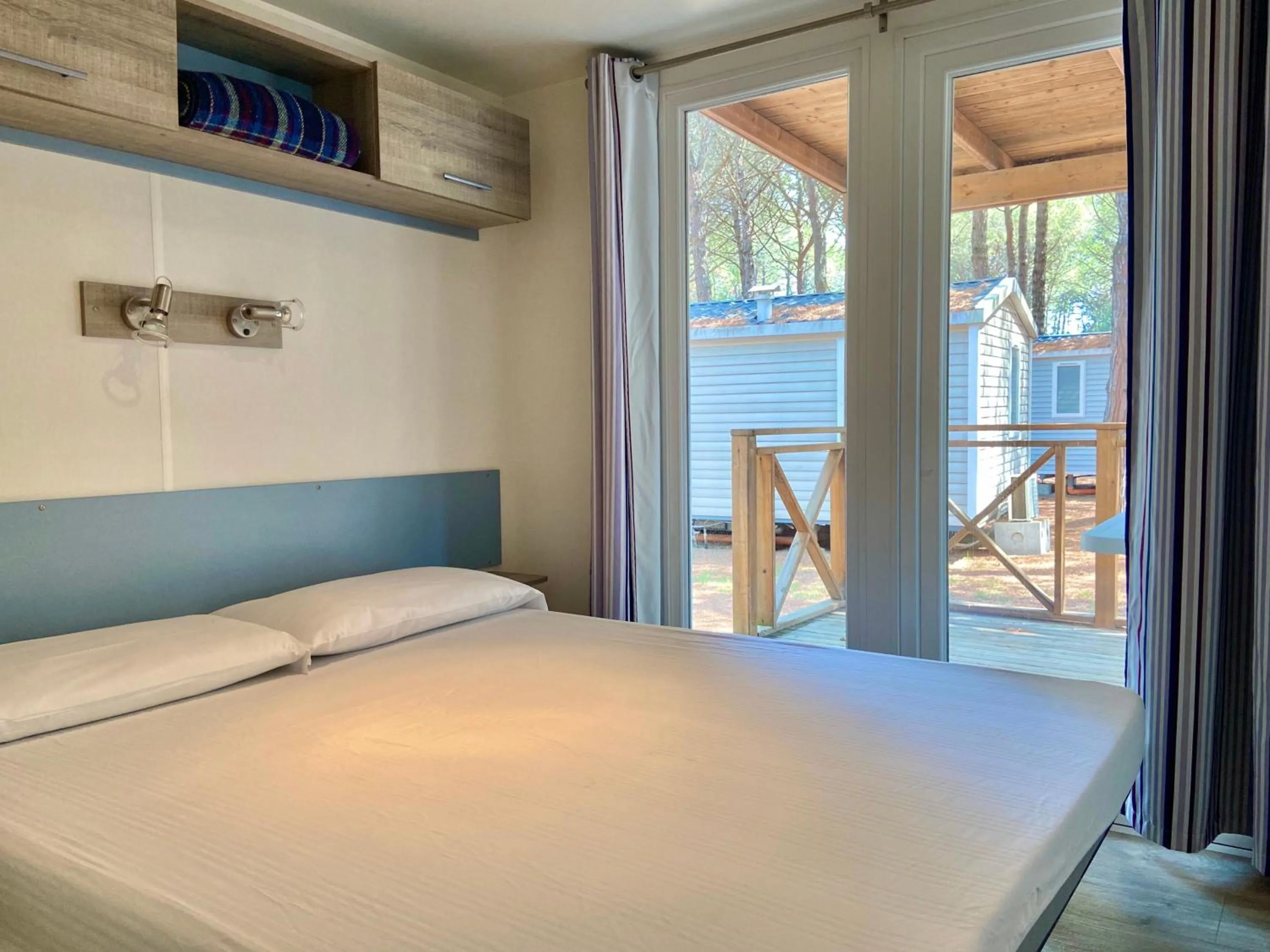 Bed in Club del Sole Spina Family Collection