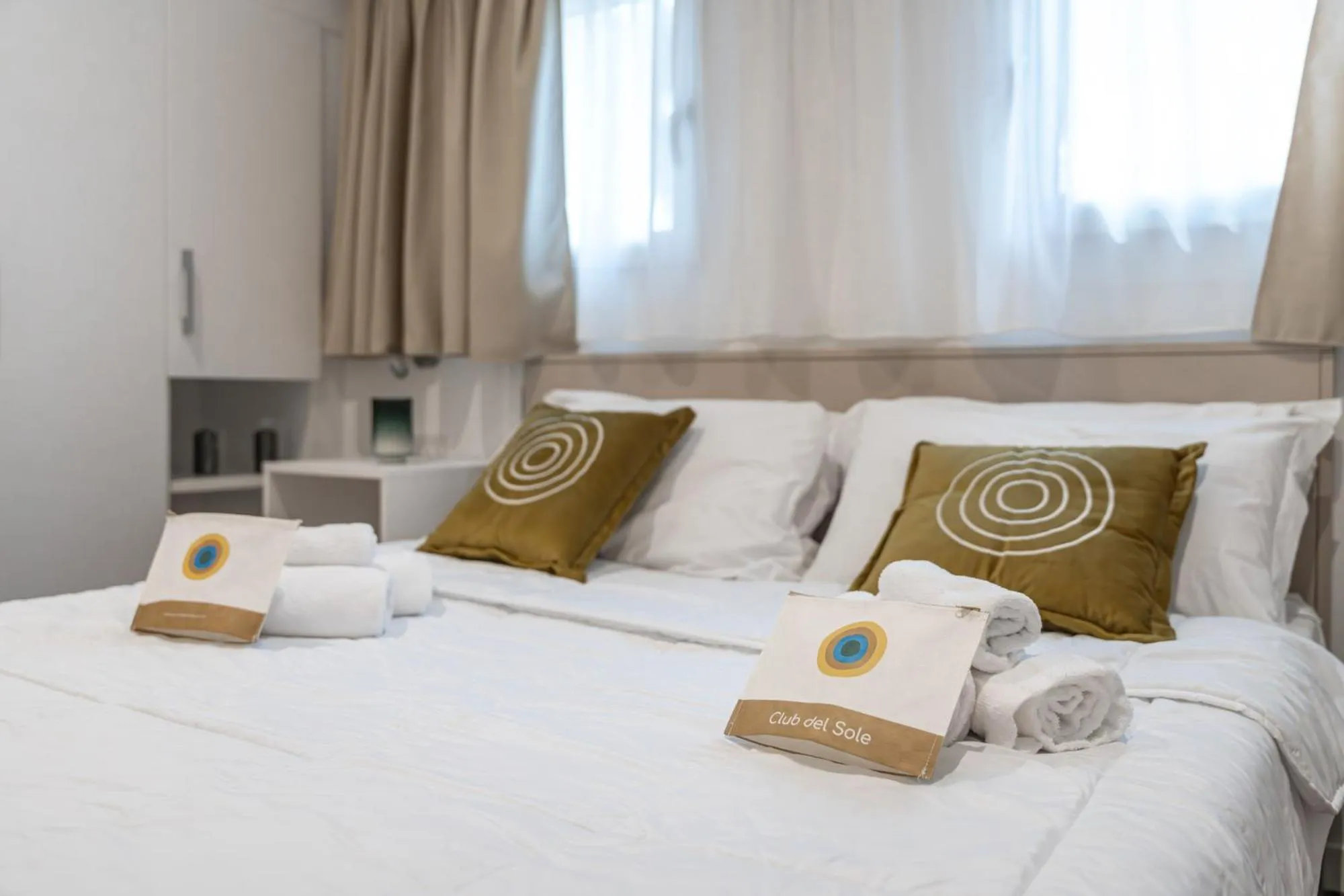 Bed in Club del Sole Spina Family Collection