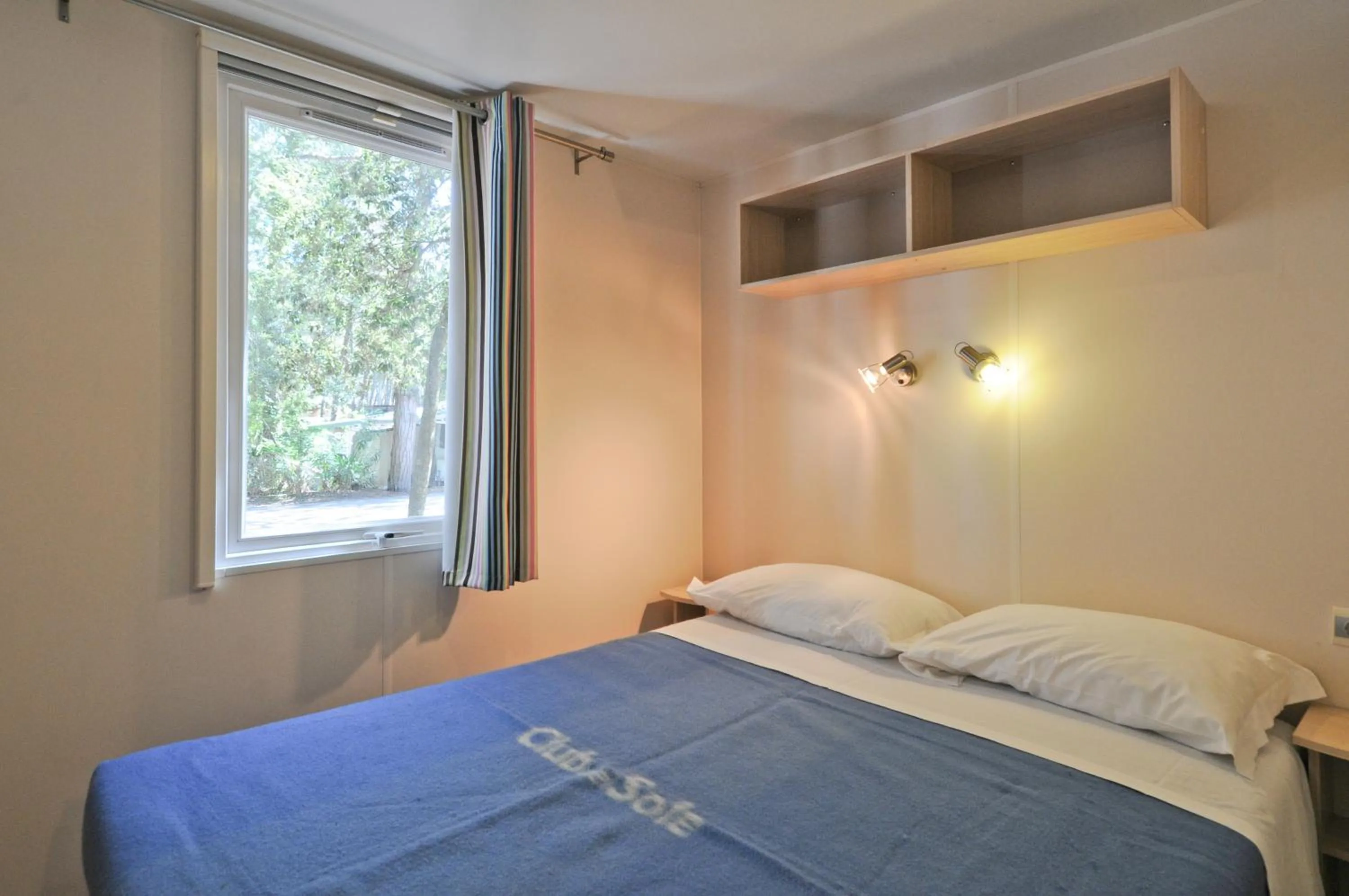 Bed in Club del Sole Spina Family Collection