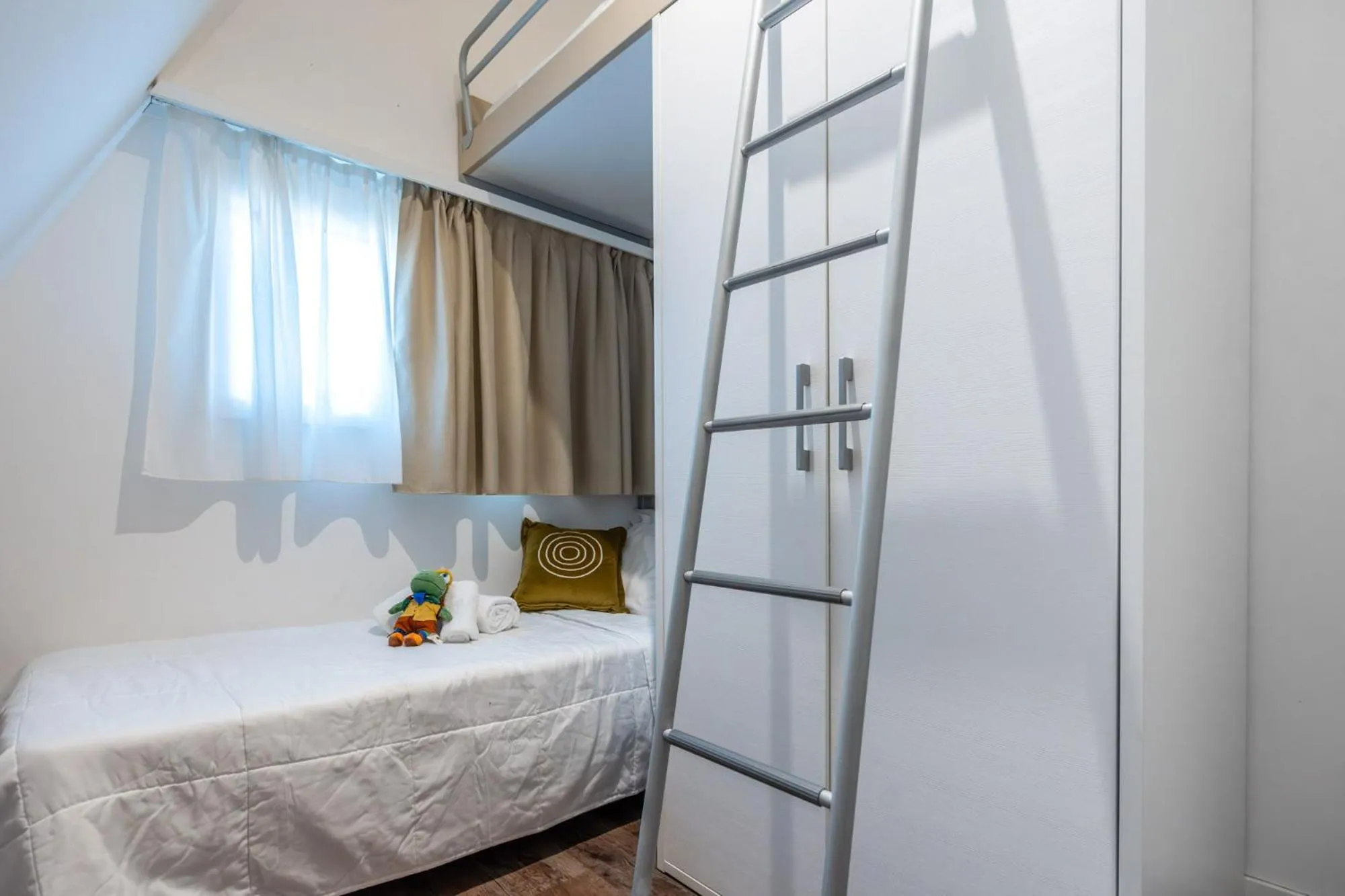 Bed in Club del Sole Spina Family Collection