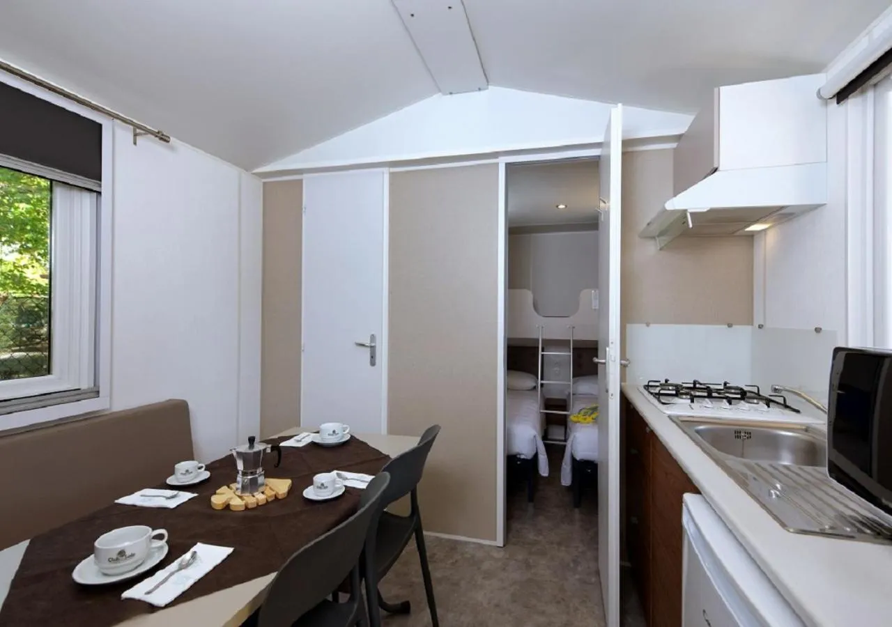 Kitchen or kitchenette in Club del Sole Vigna sul Mar Family Collection