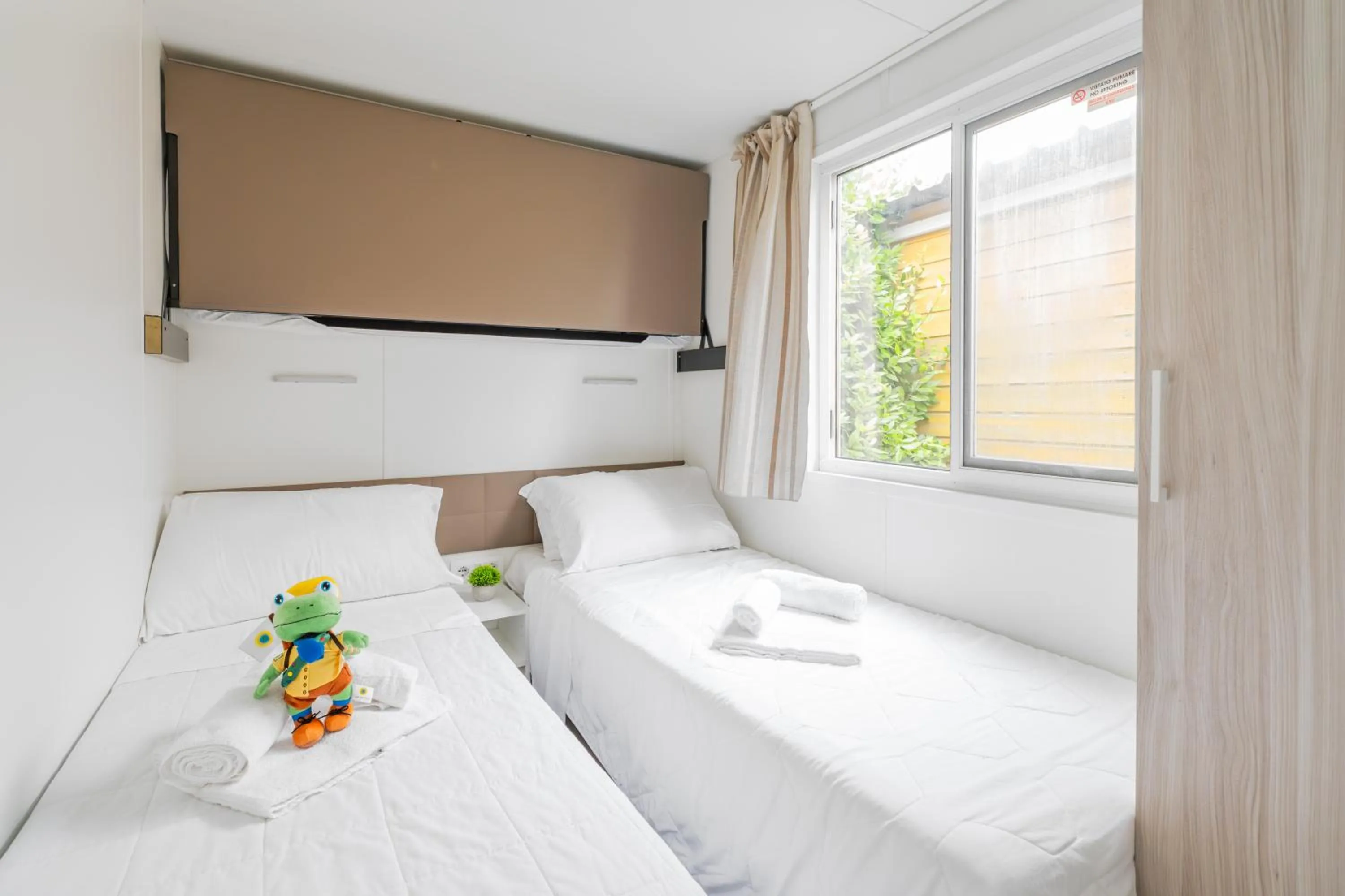 Bed in Club del Sole Vigna sul Mar Family Collection