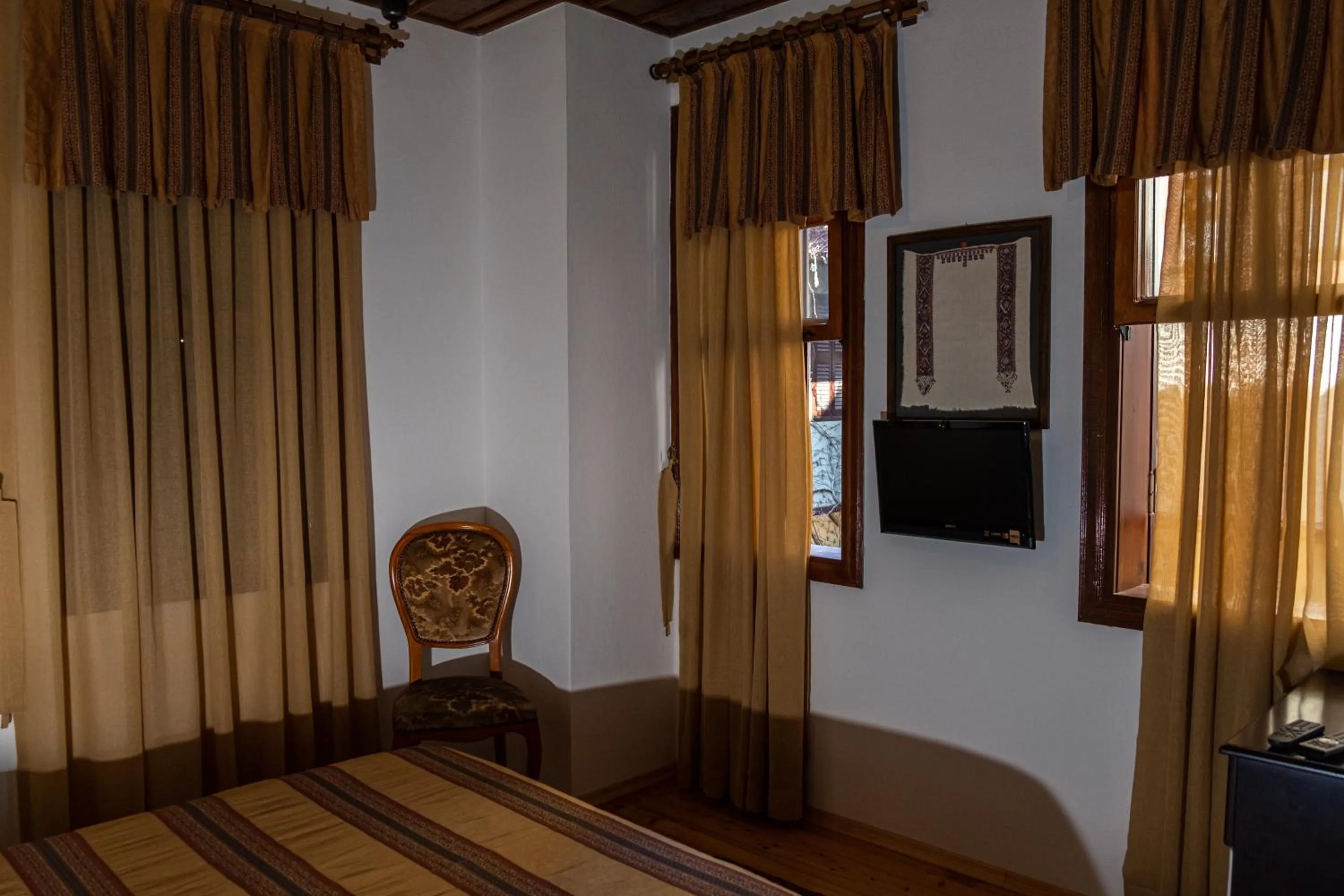 Bed in Atelya Art Hotel