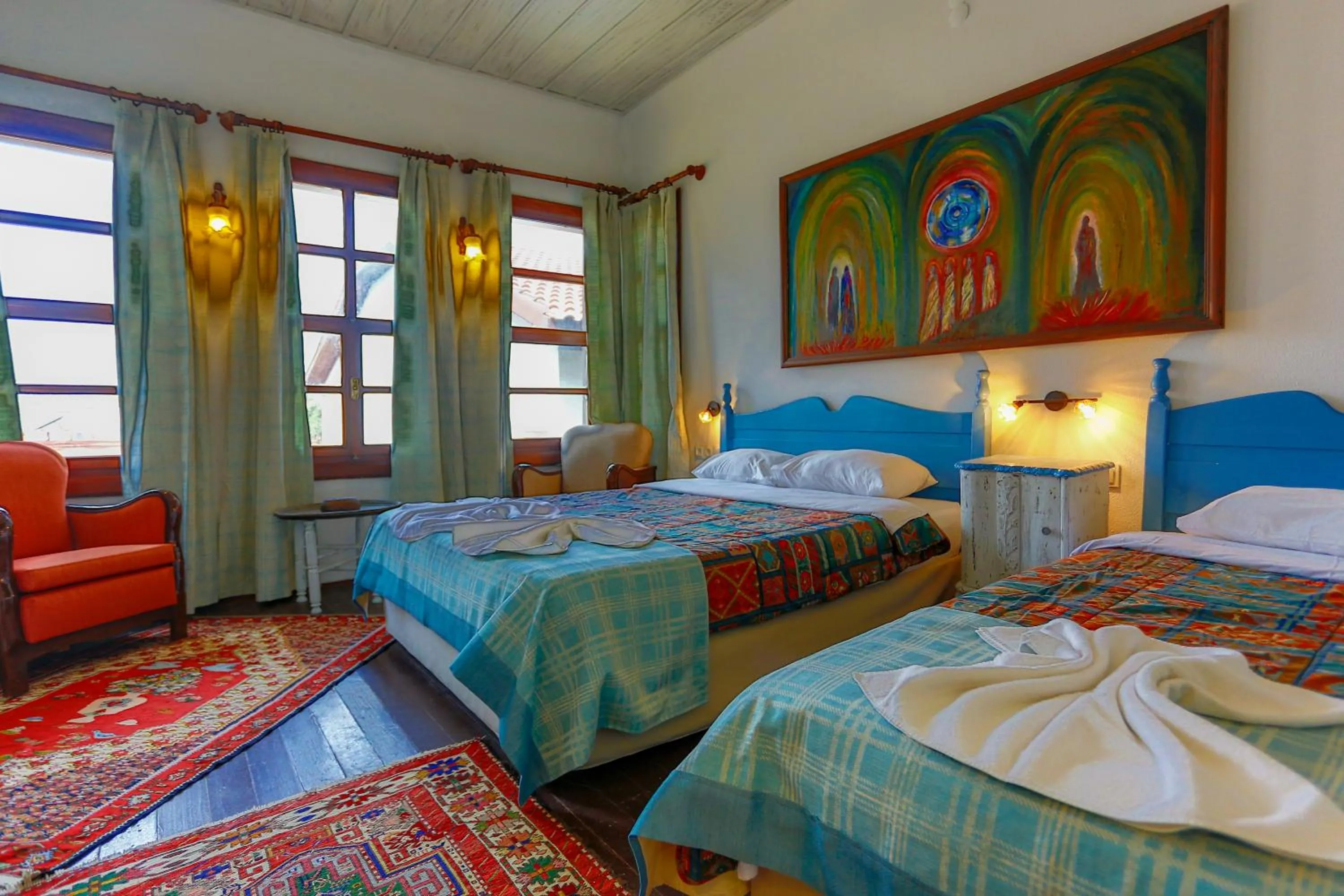 Bed in Atelya Art Hotel