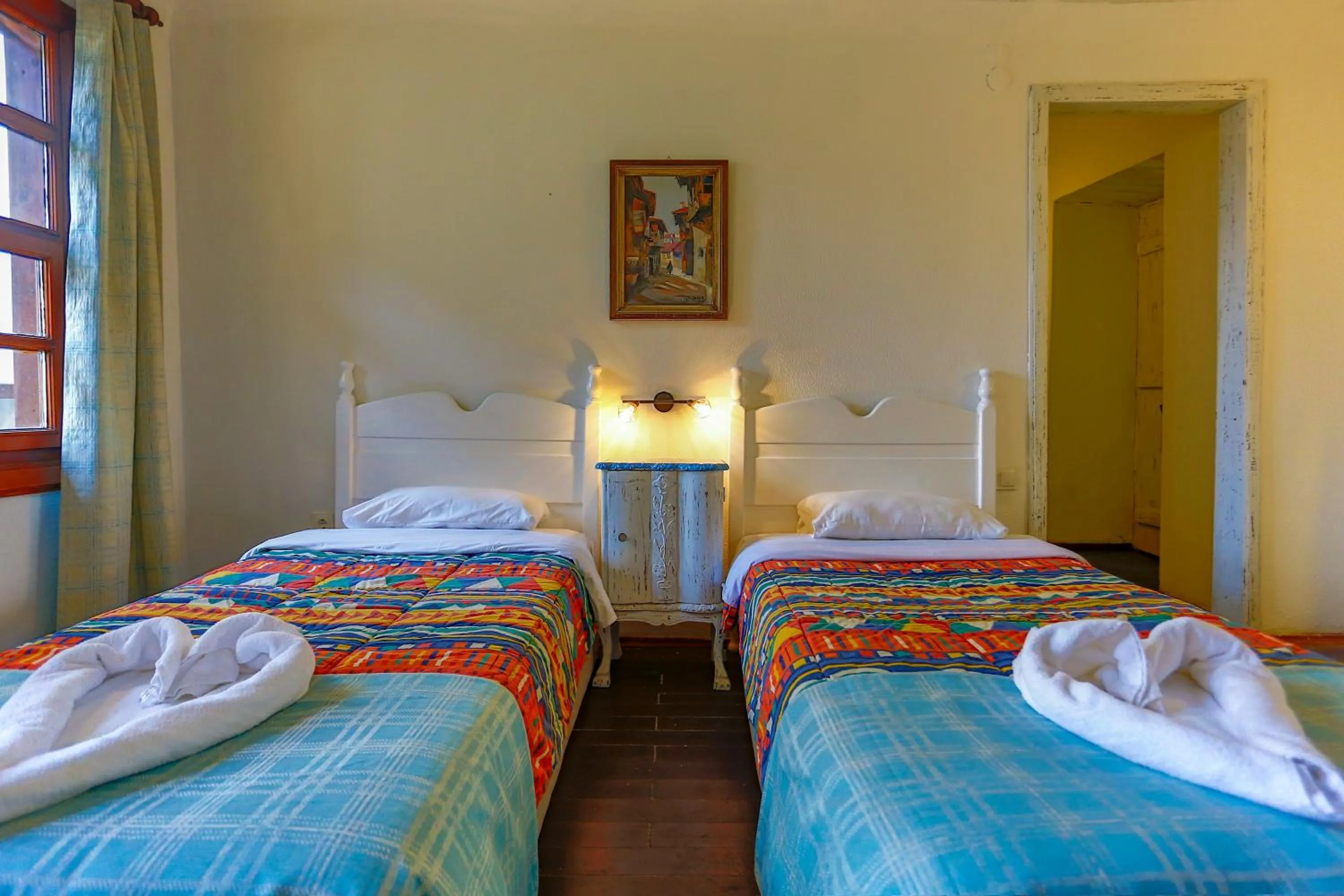 Bed in Atelya Art Hotel