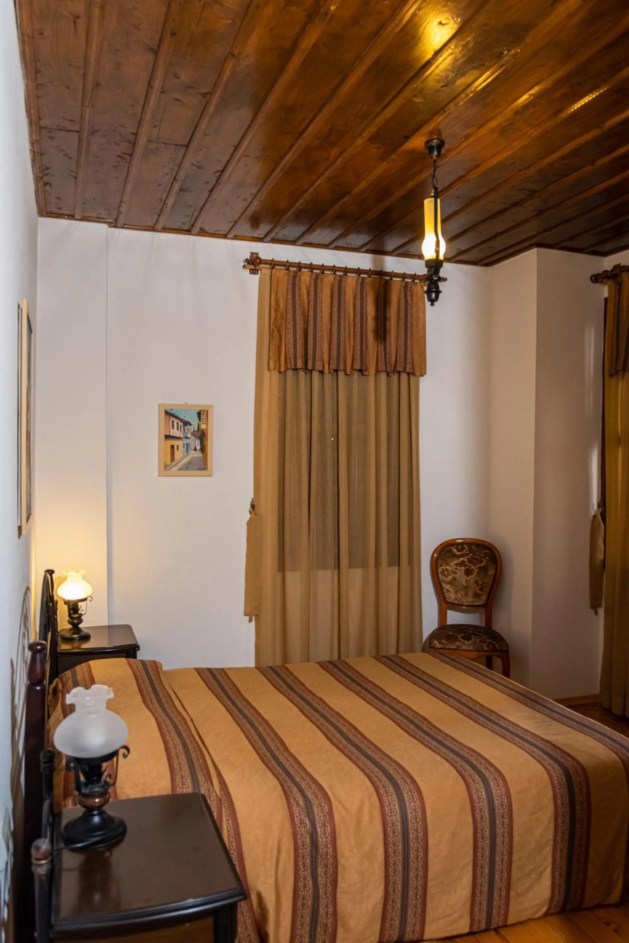 Bed in Atelya Art Hotel