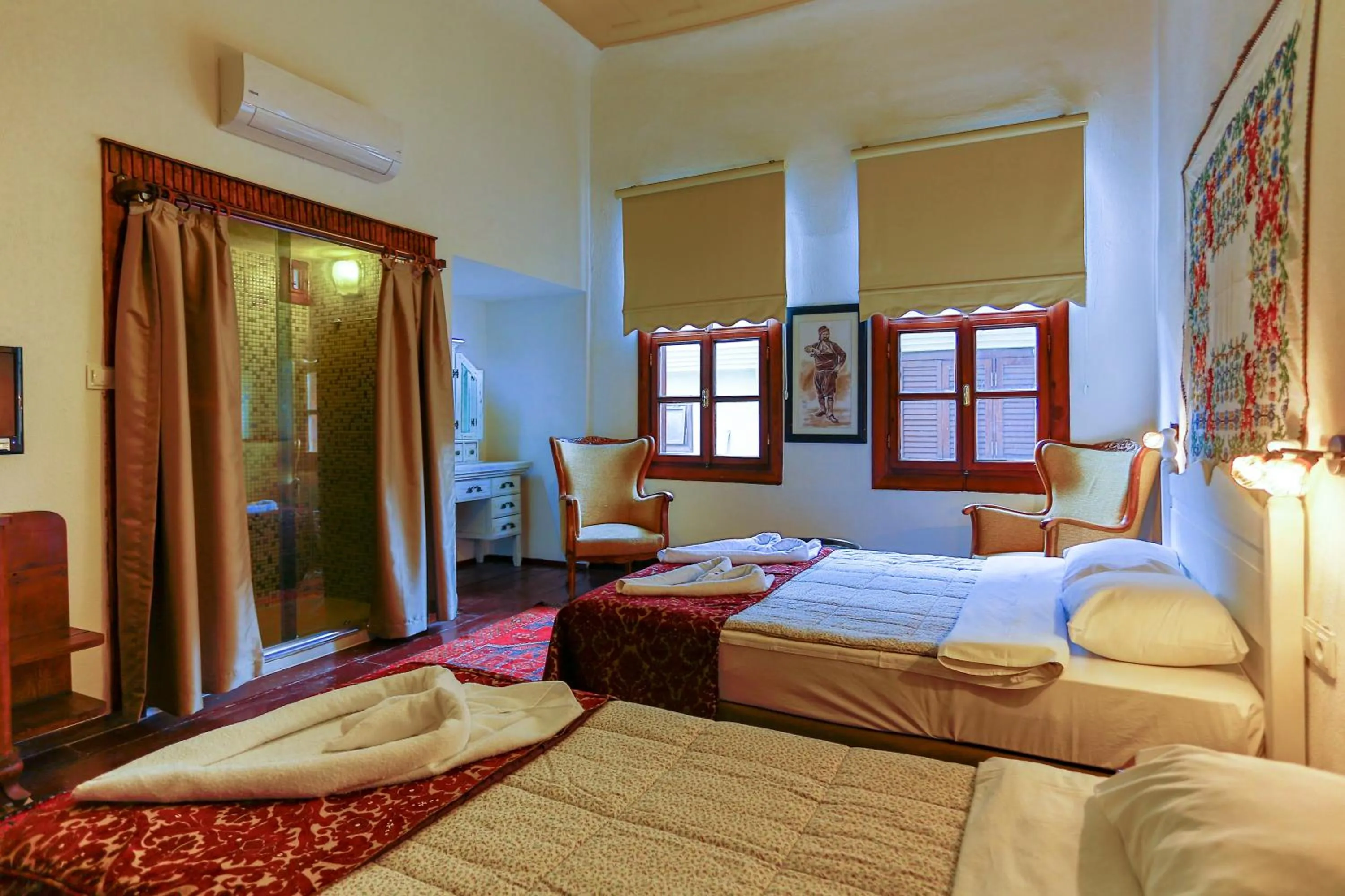 Bed in Atelya Art Hotel
