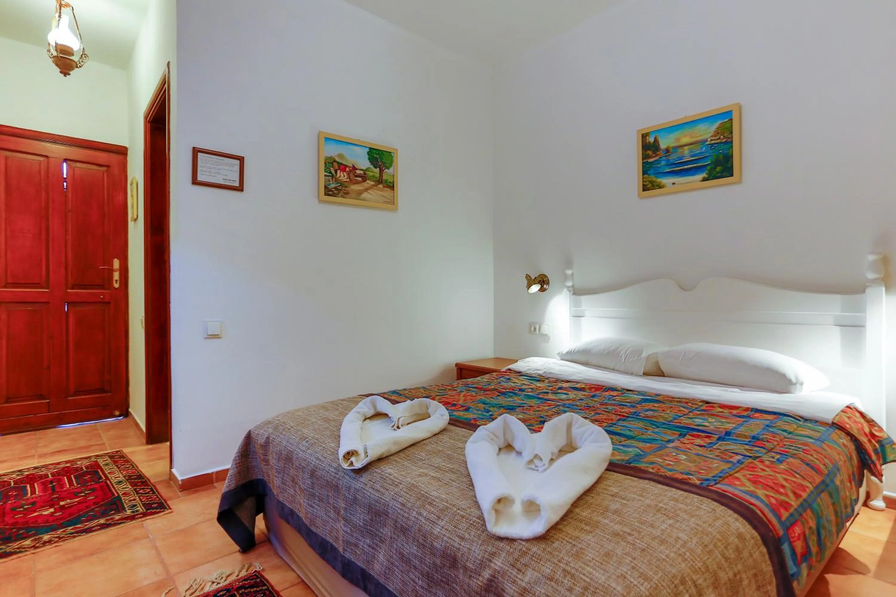 Bed in Atelya Art Hotel