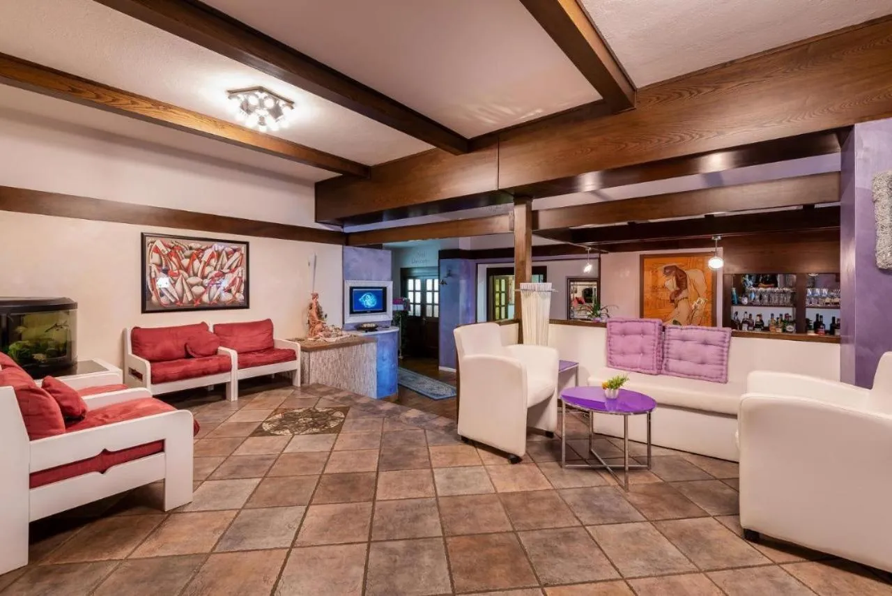 Lounge or bar in Hotel Latemar