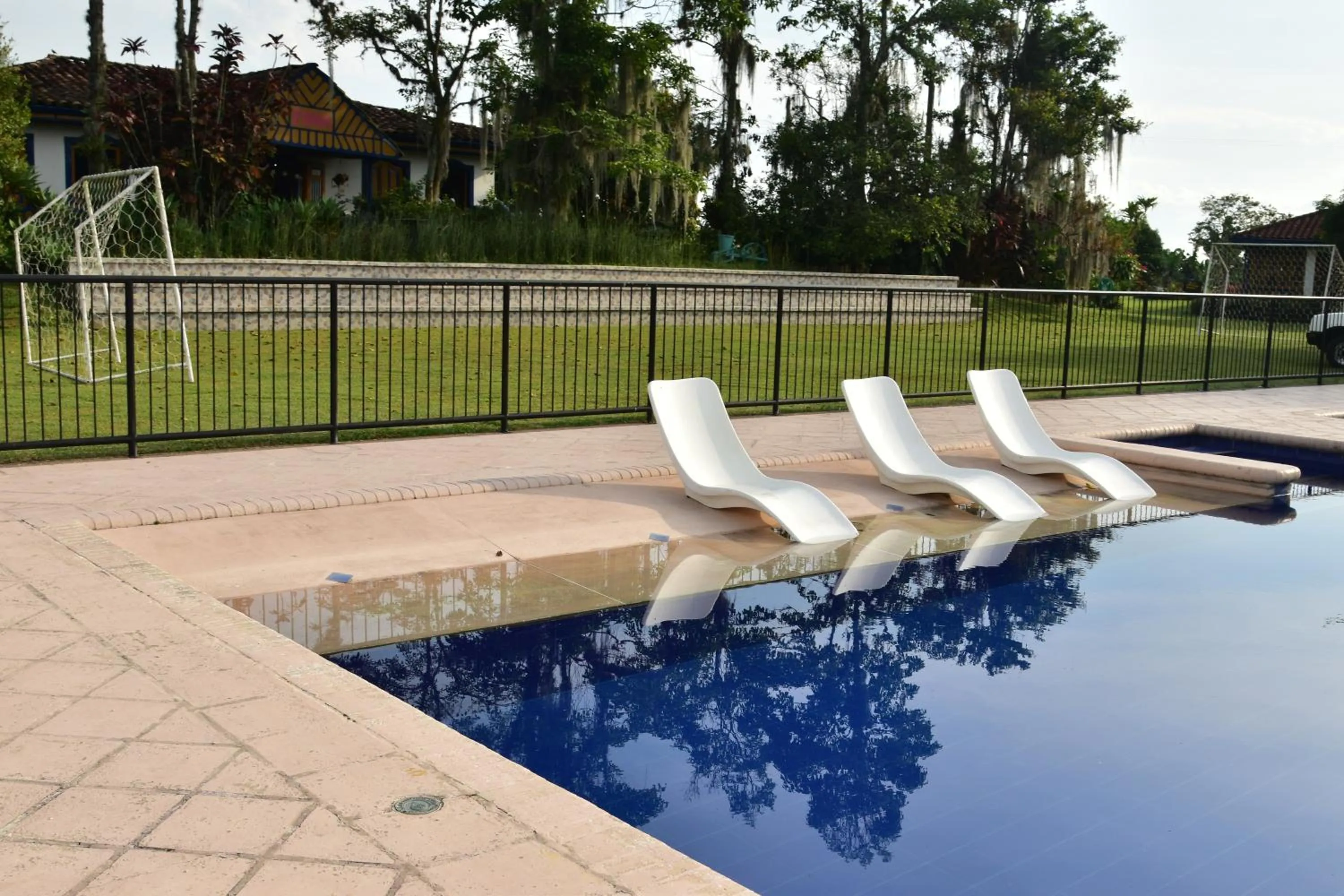 Swimming pool in Finca Hotel Los Girasoles