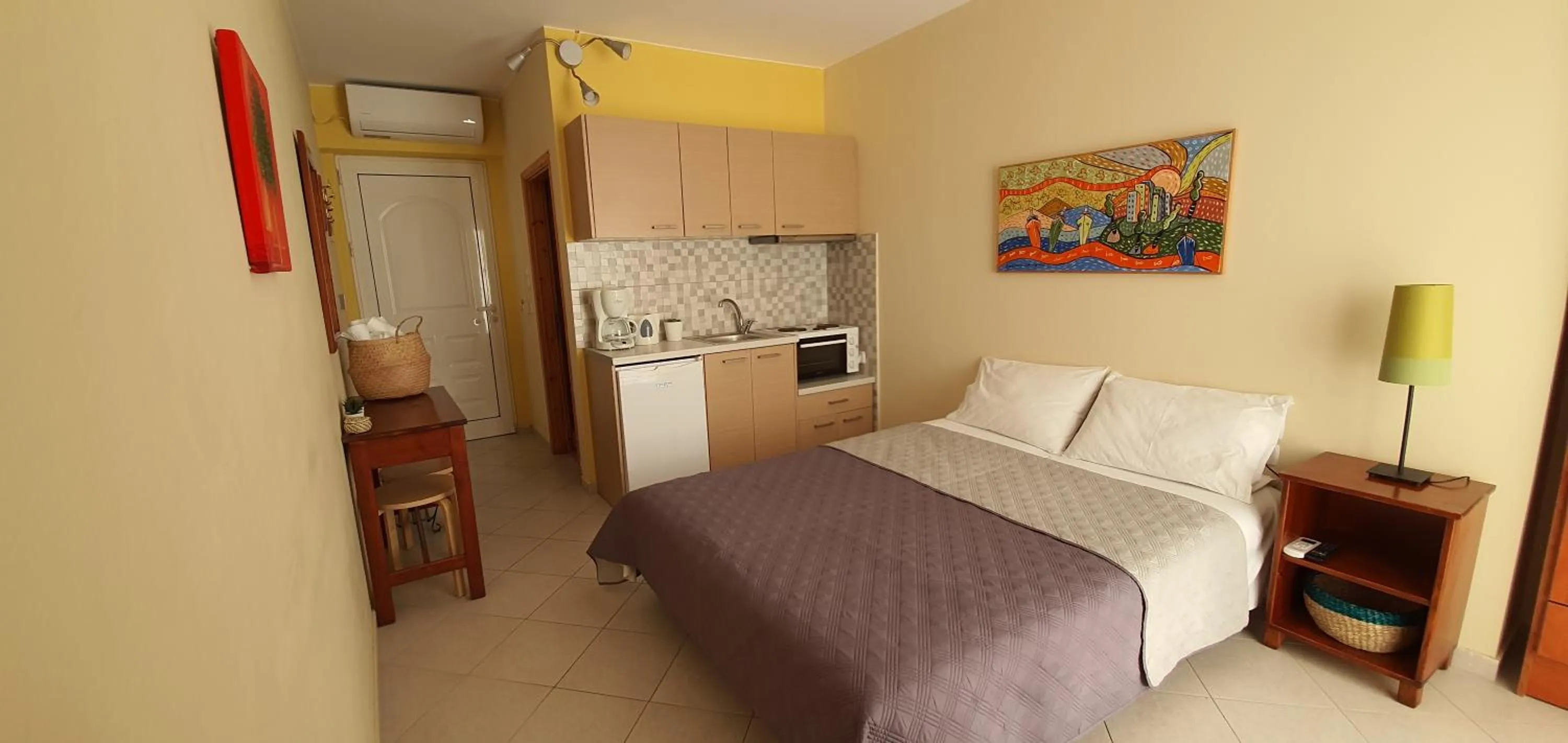 Photo of the whole room, Bed in Vasilis Studios