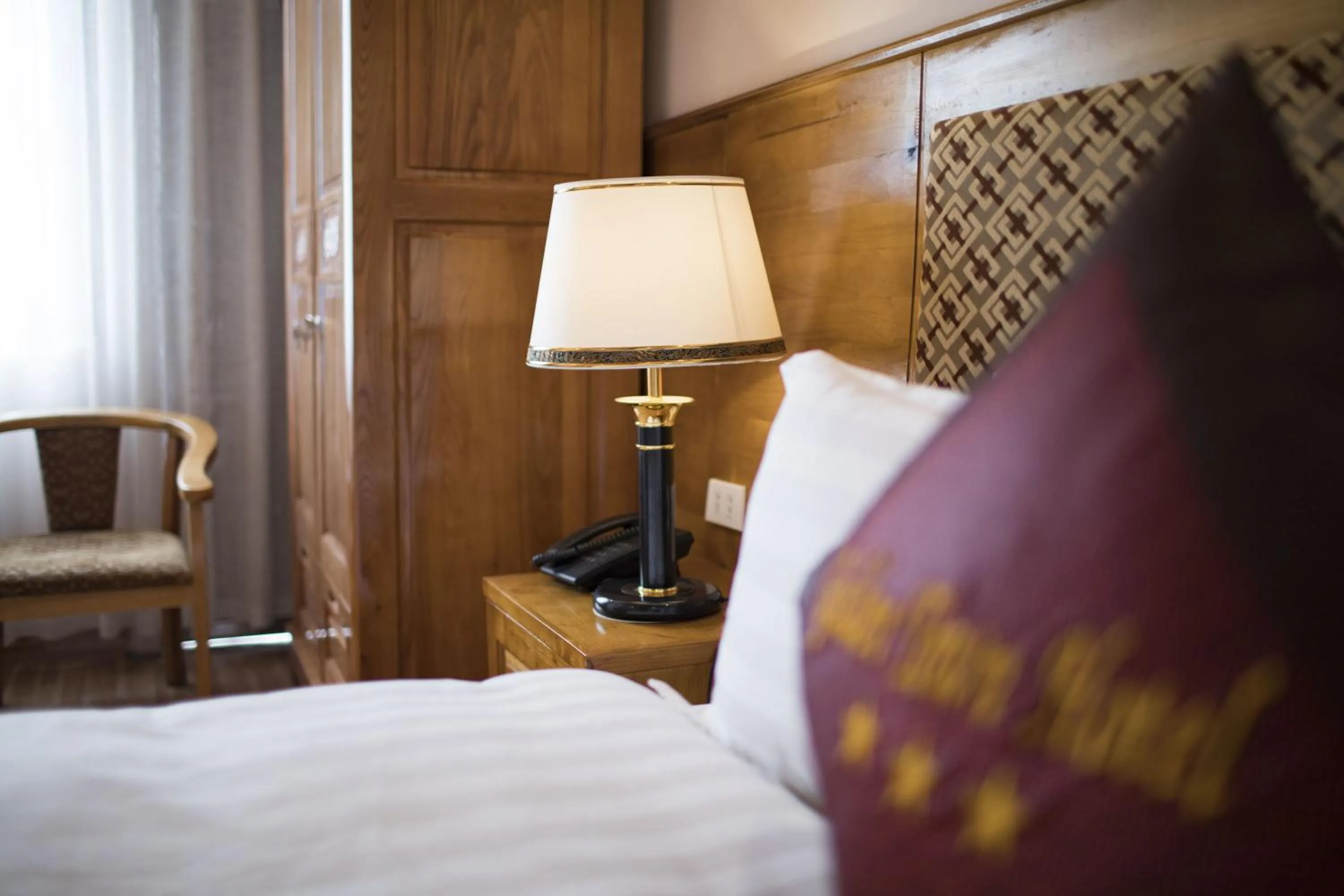 Bed in Golden Town Hotel