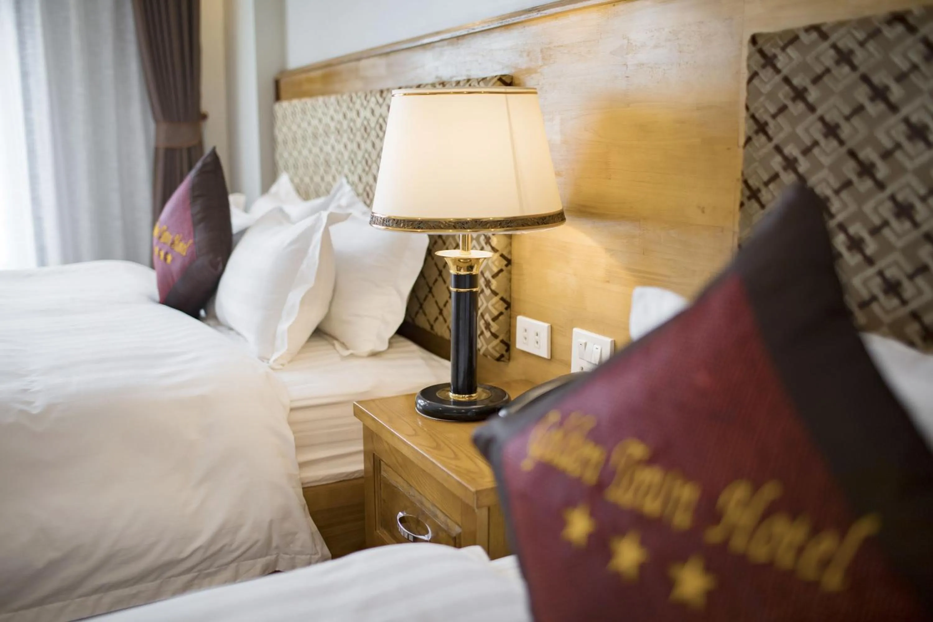 Bed in Golden Town Hotel