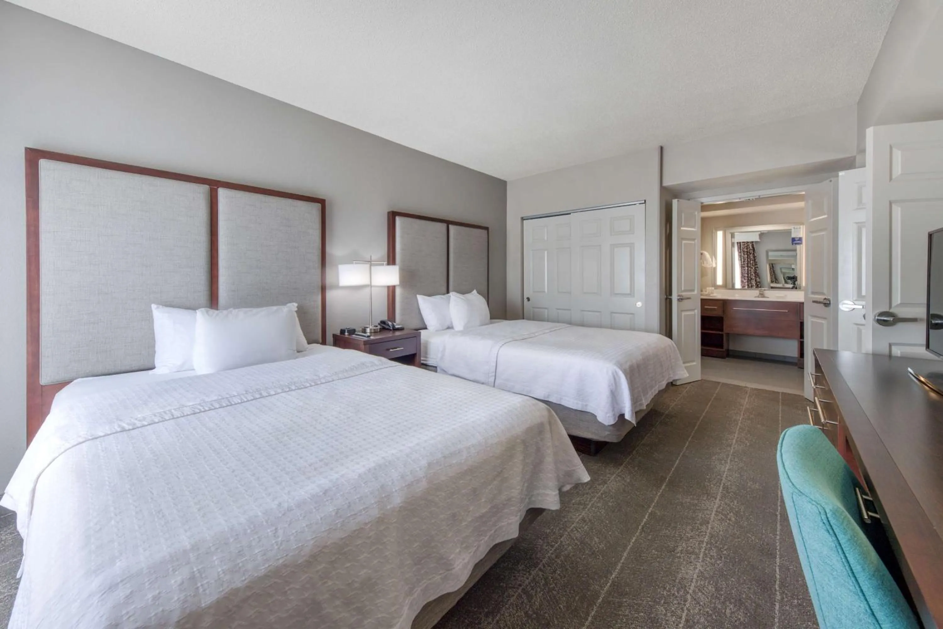 Bed in Homewood Suites by Hilton Olmsted Village