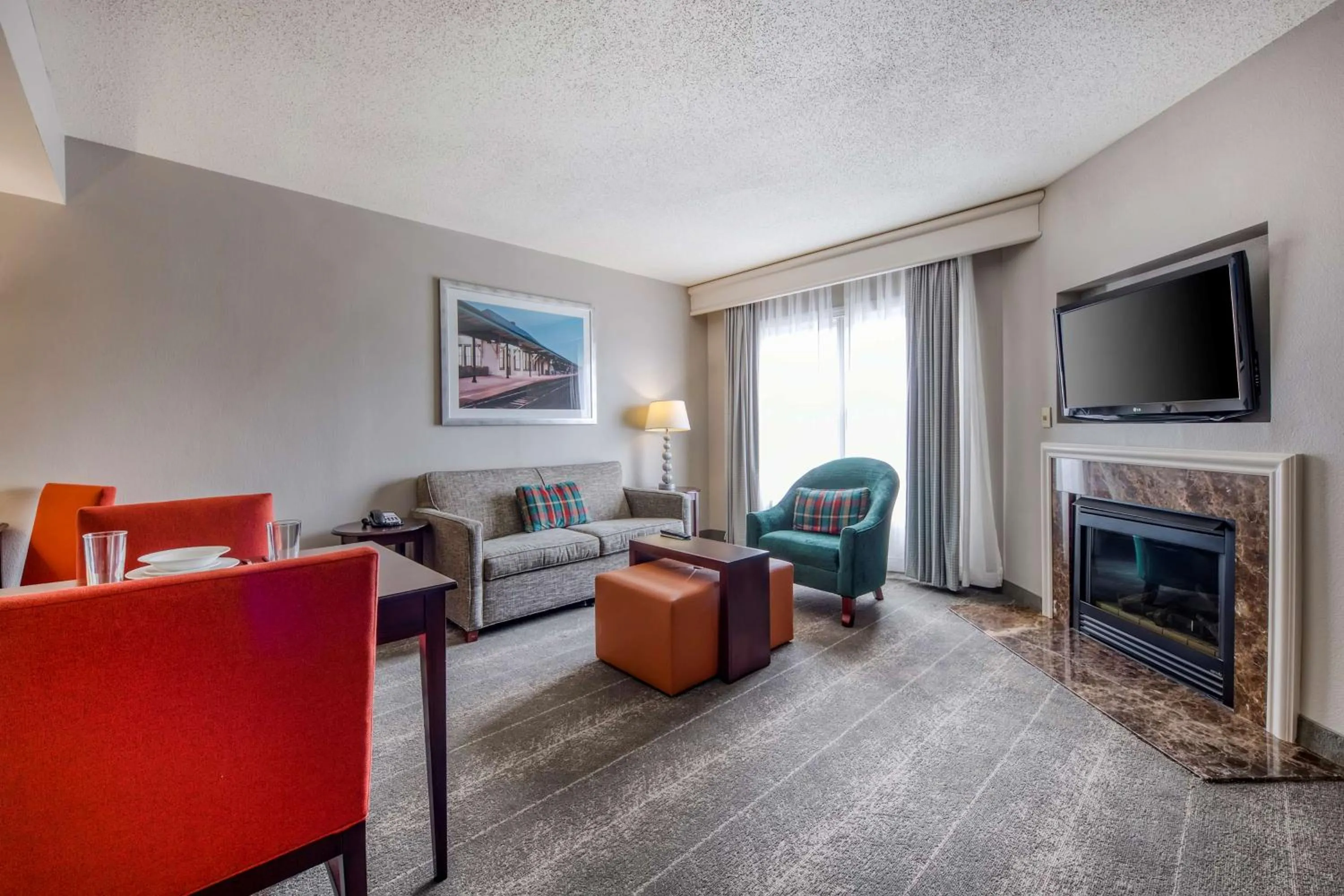 Living room in Homewood Suites by Hilton Olmsted Village