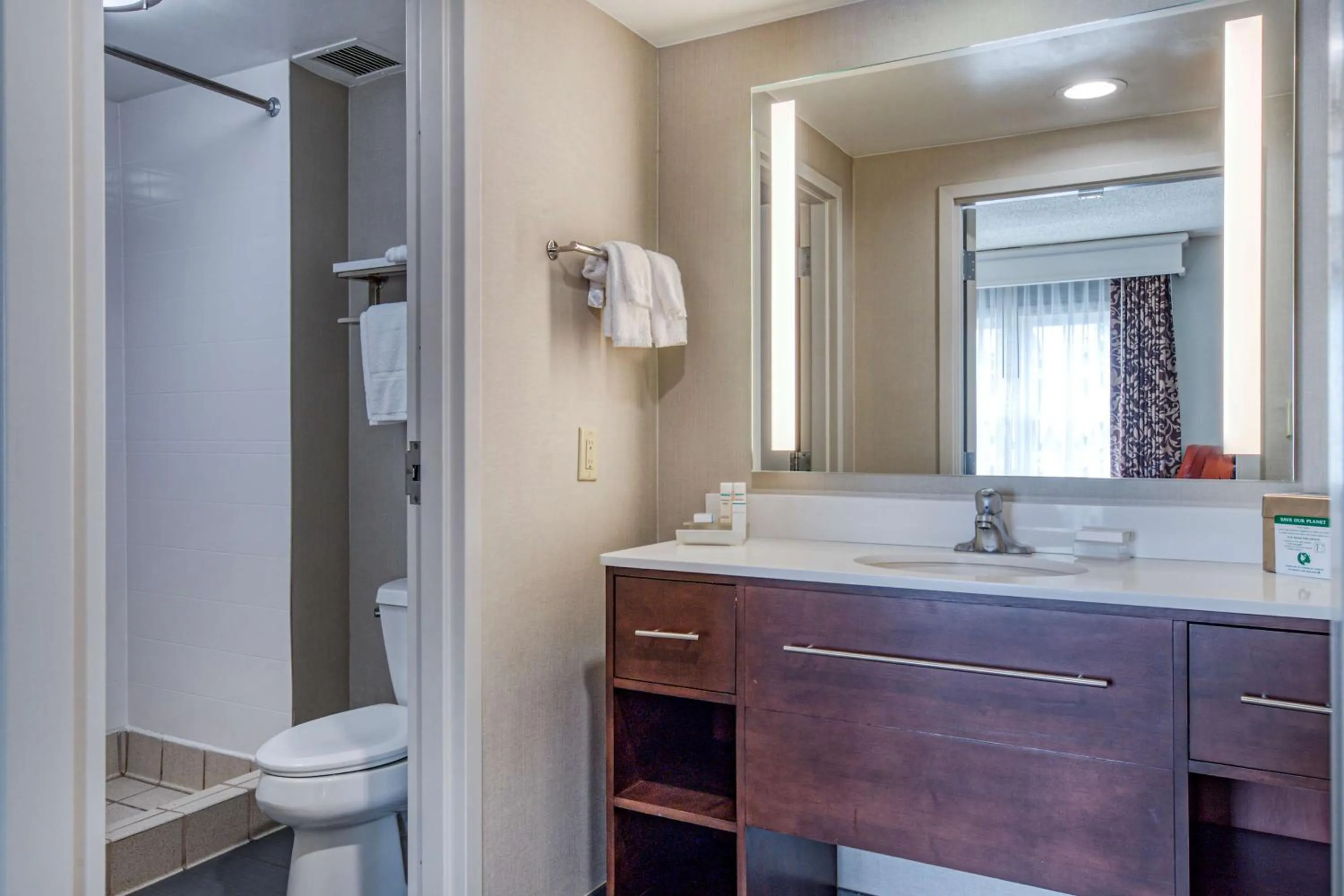 Bathroom in Homewood Suites by Hilton Olmsted Village