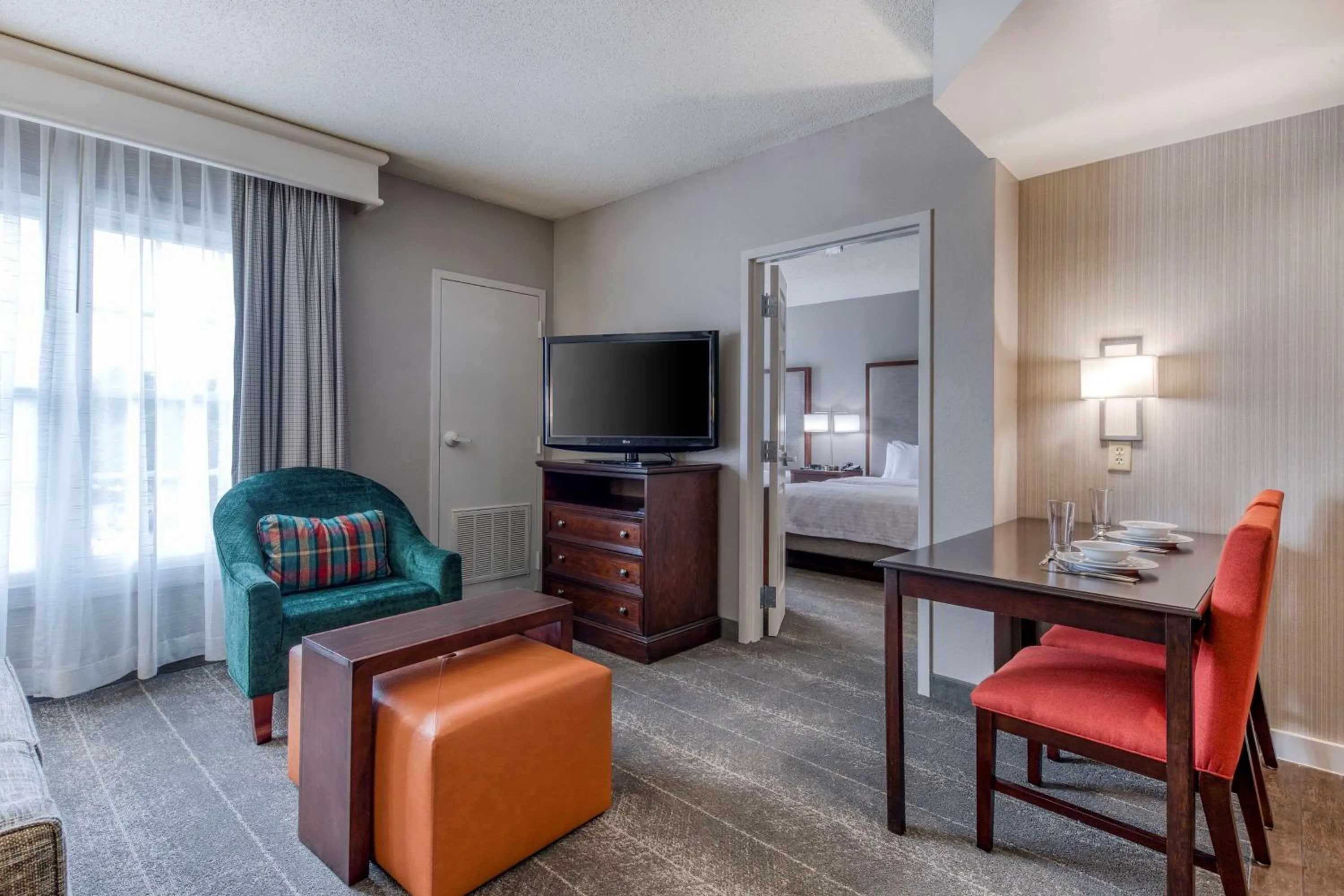 Living room in Homewood Suites by Hilton Olmsted Village