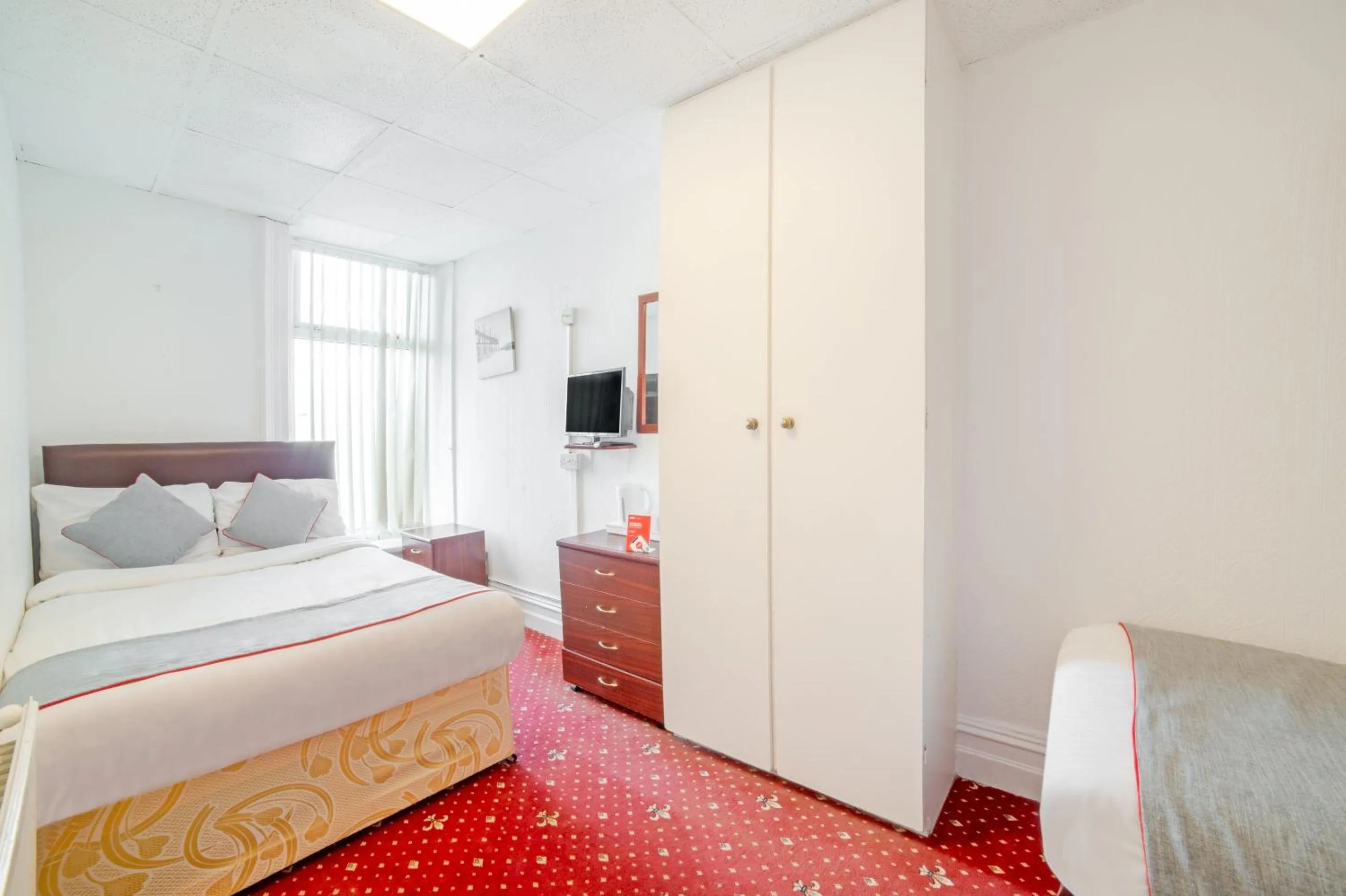 Bedroom in OYO The Golden Cheval Hotel