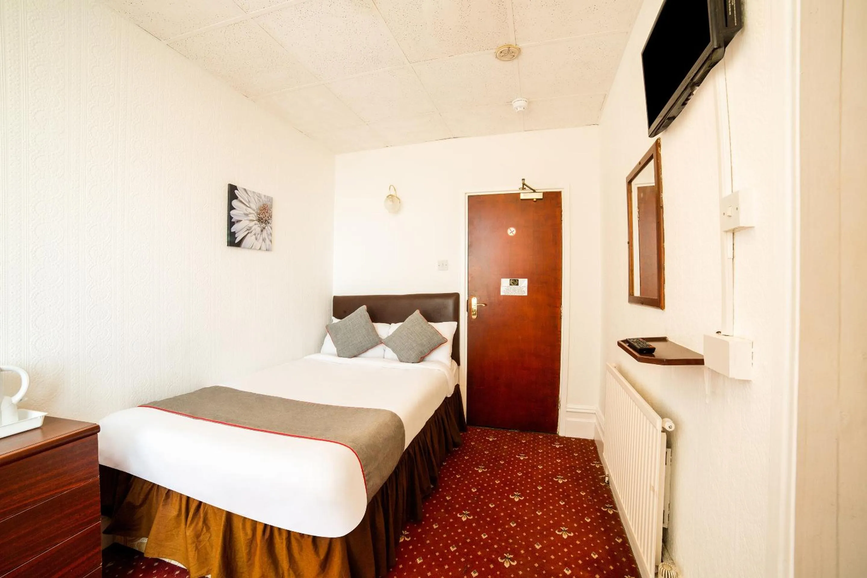 Bedroom in OYO The Golden Cheval Hotel