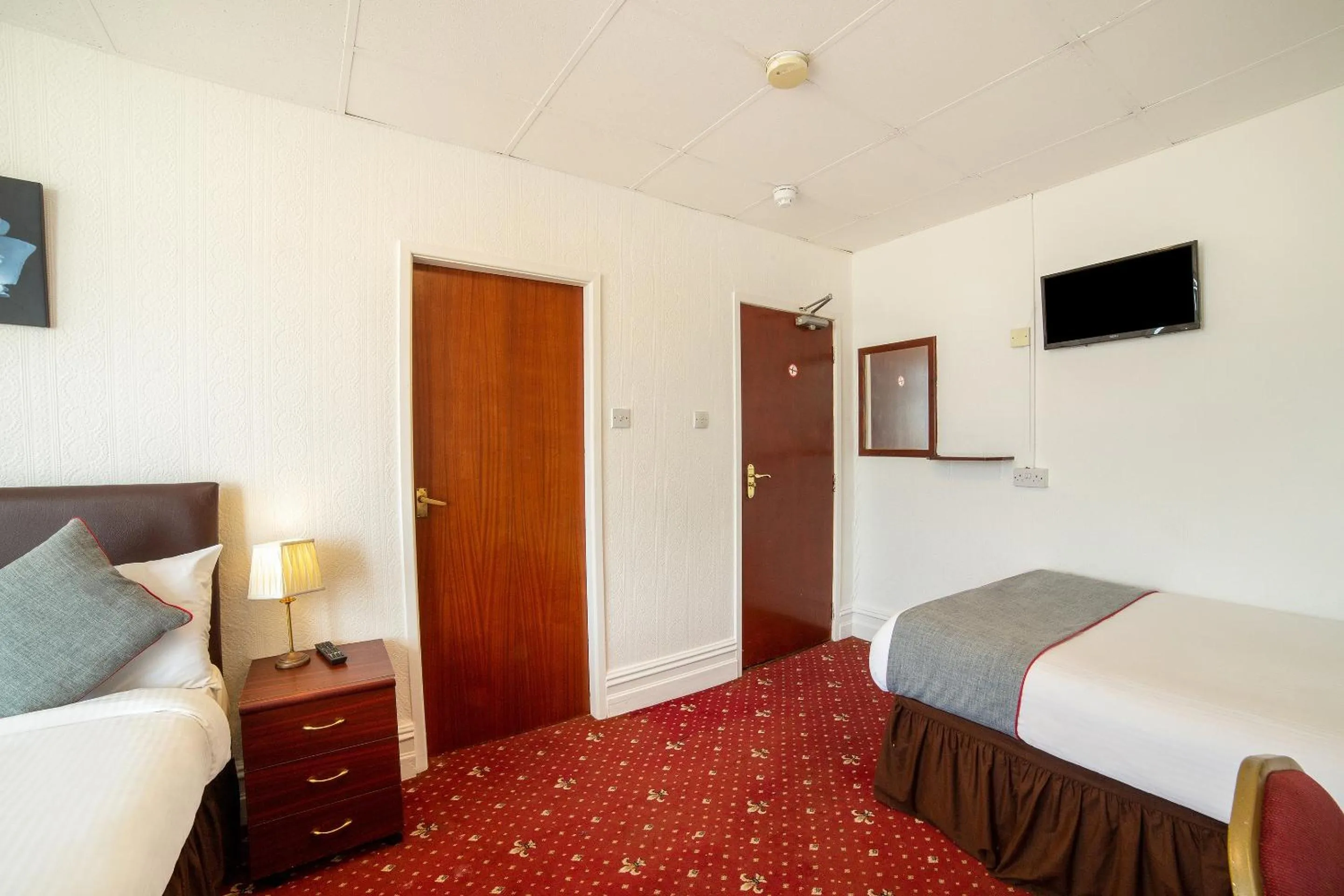 Bedroom in OYO The Golden Cheval Hotel