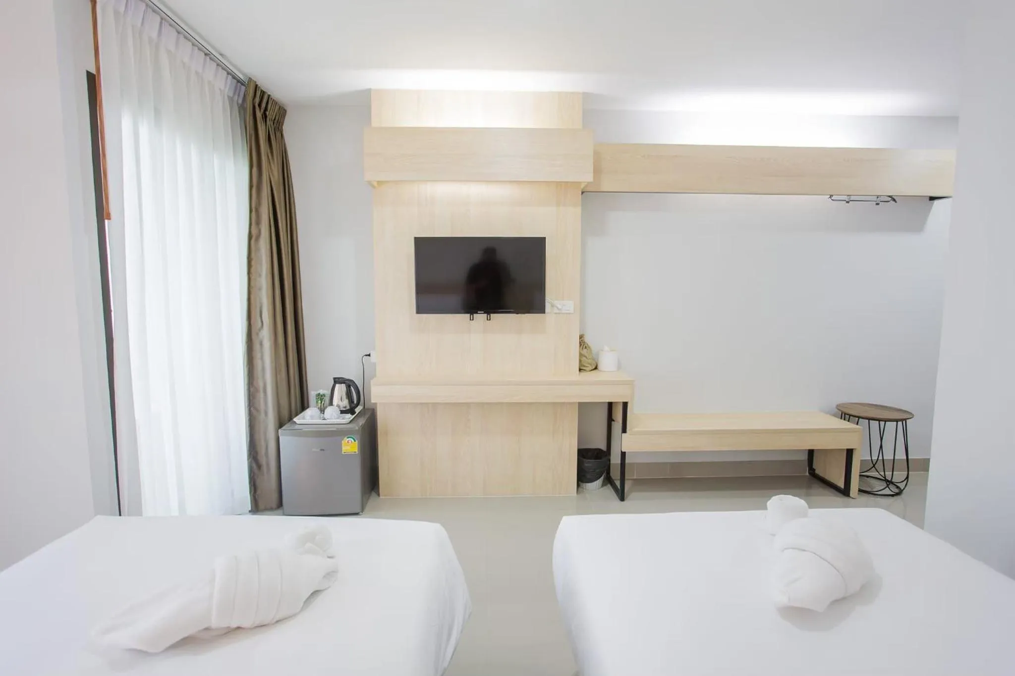 Bed in Sasi Nonthaburi Hotel