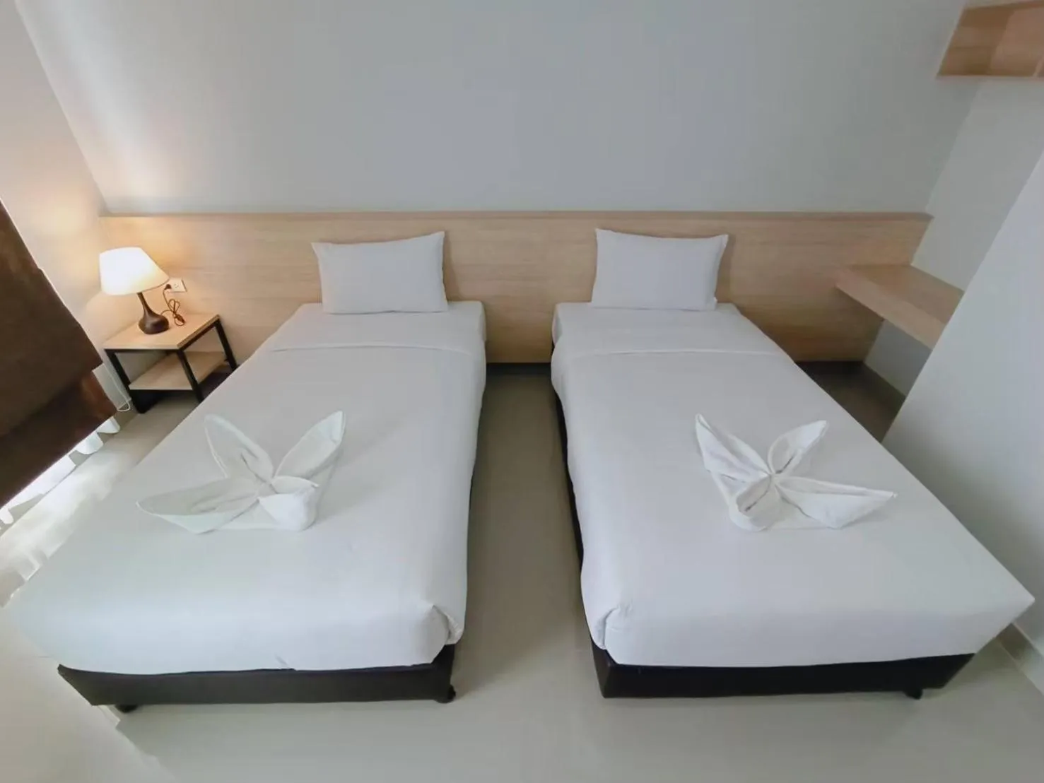 Bed in Sasi Nonthaburi Hotel