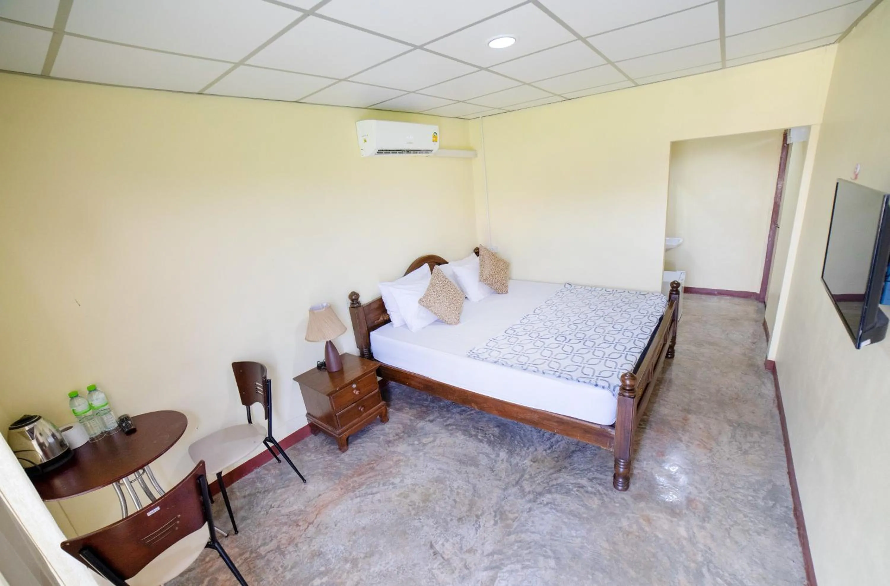 Bed in Sasi Nonthaburi Hotel