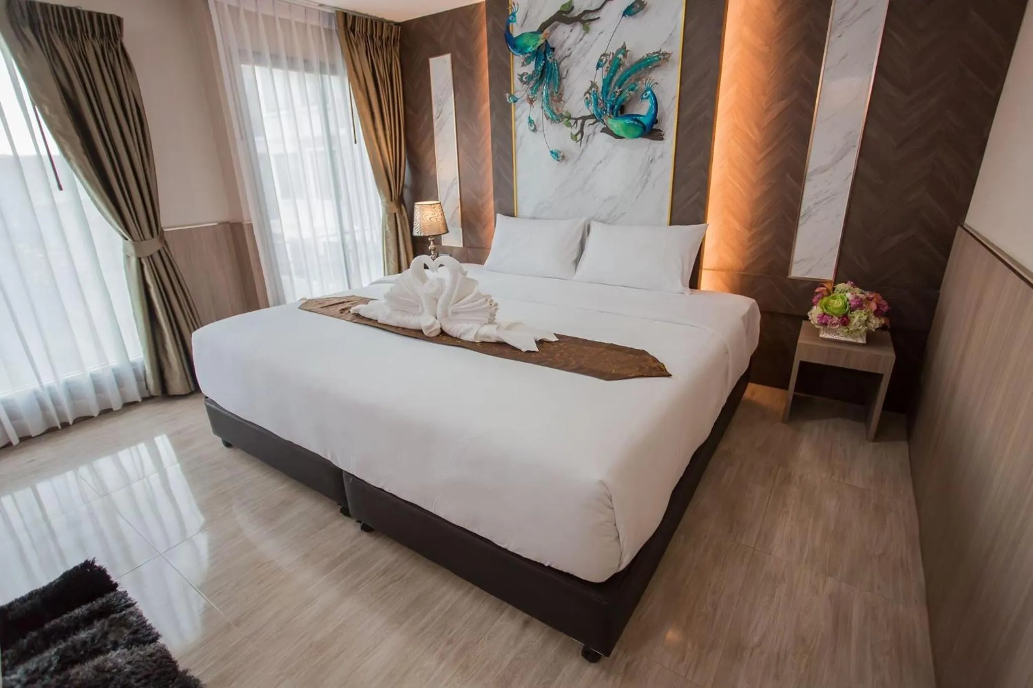 Bed in Sasi Nonthaburi Hotel