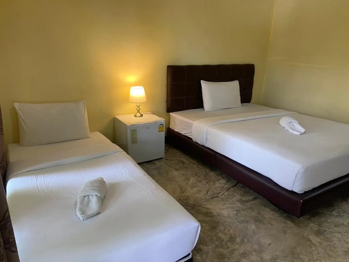 Bed in Sasi Nonthaburi Hotel